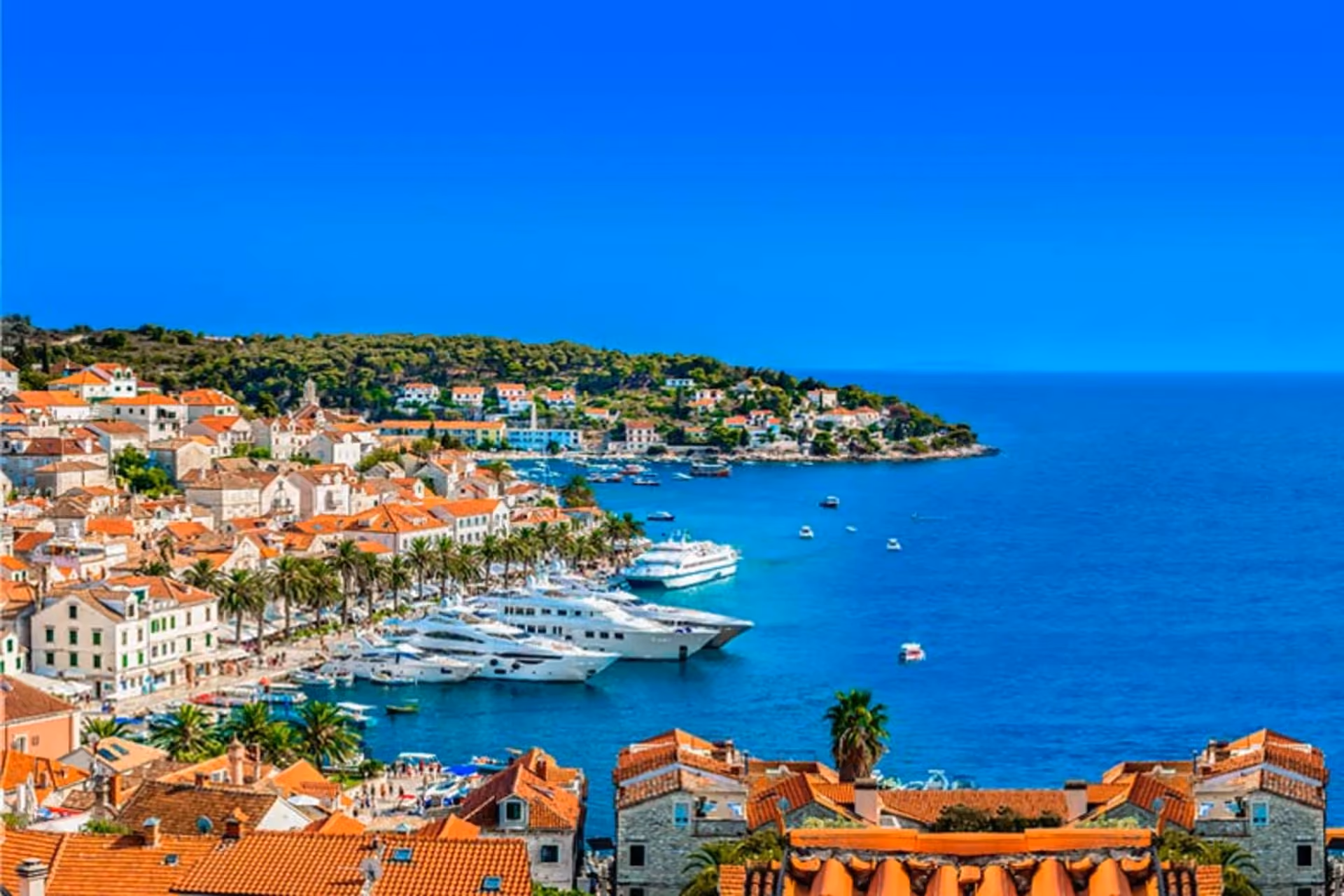 Bright blue seas, historic coastal towns, and island views make Croatia one of the most scenic July destinations.
