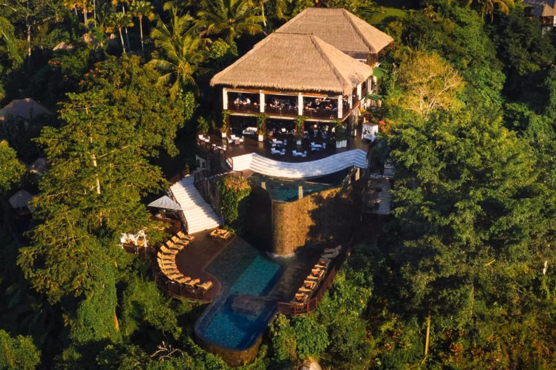 Iconic infinity pools floating above lush valleys create a dreamlike romantic stay