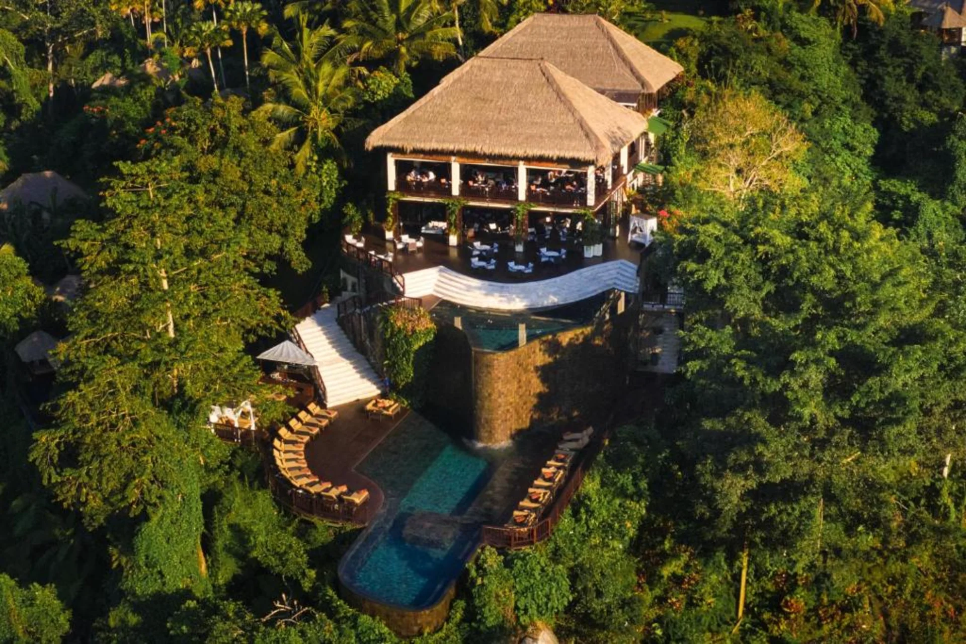 Iconic infinity pools floating above lush valleys create a dreamlike romantic stay