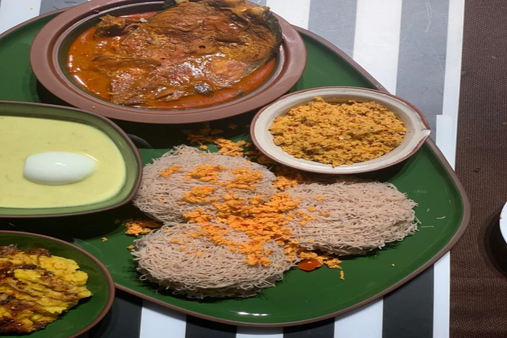 Famous Sri Lankan food string hoppers — a traditional Sri Lanka food item made from rice flour, served with dhal and coconut sambol