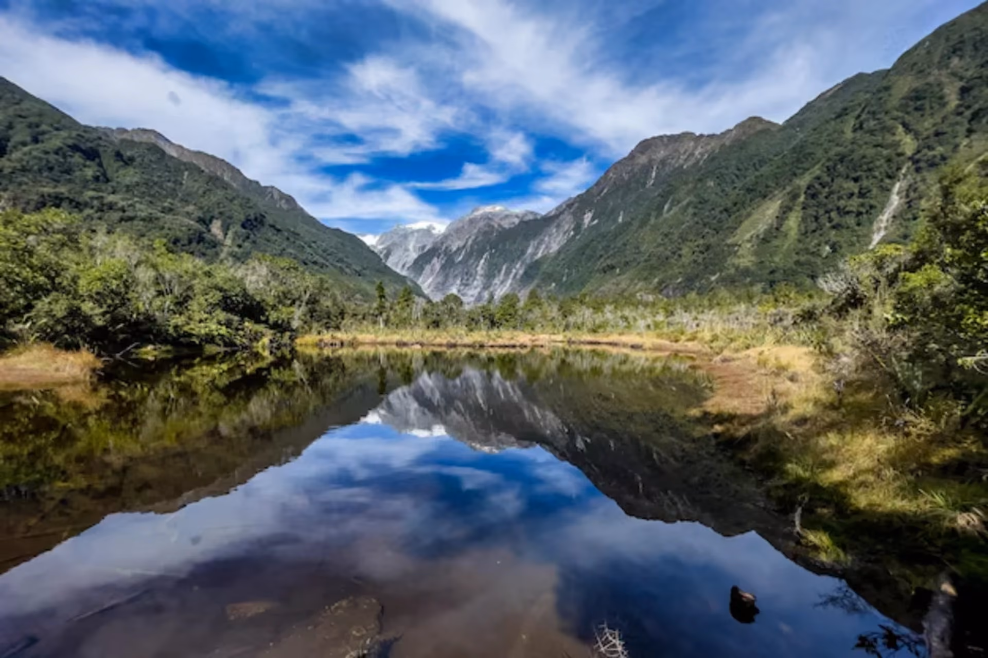 Best countries to visit in May – lush green fjords and scenic landscapes of New Zealand for a dreamy 7-day trip