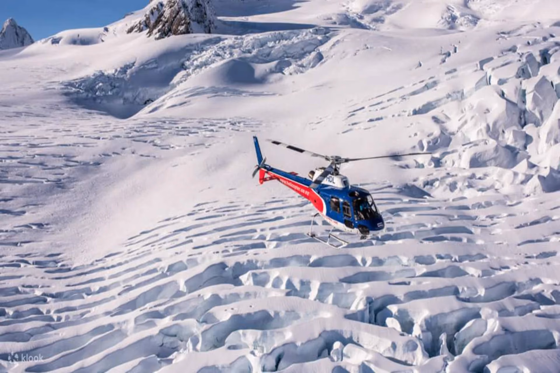 Helicopter glacier landing New Zealand cost of travel — Franz Josef romantic luxury experience