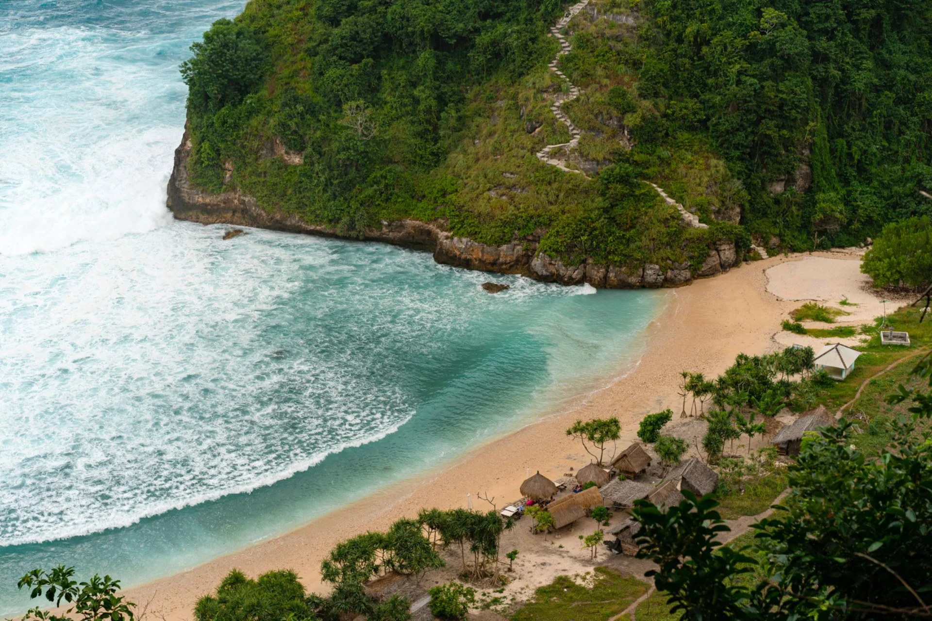 Atuh Beach Bali luxury travel destination in January – hidden cove with turquoise water and jungle cliffs