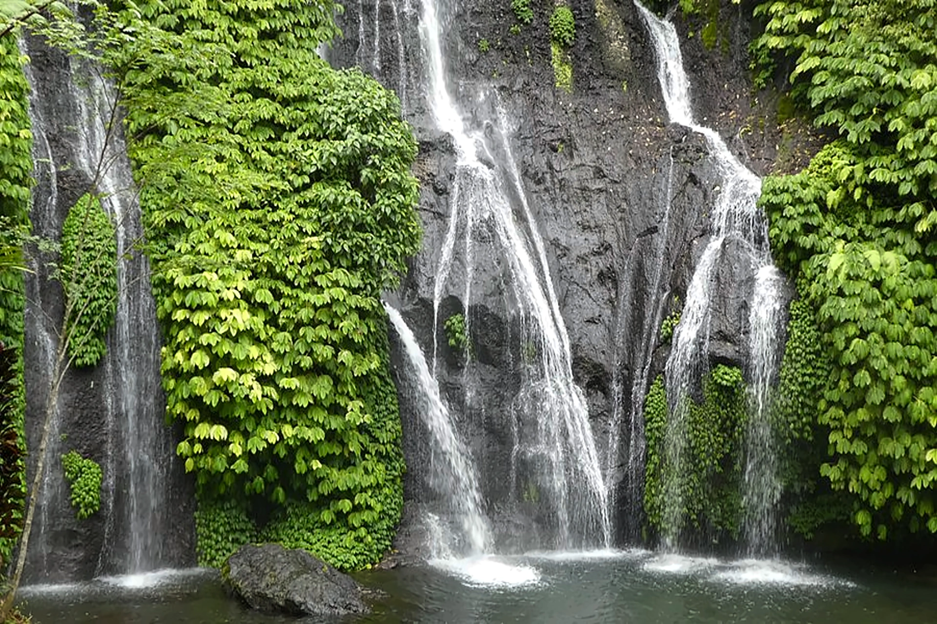 Secluded Banyumala Twin Waterfalls in North Bali reveal another side of Bali vs Vietnam: best for couples who hate crowds.