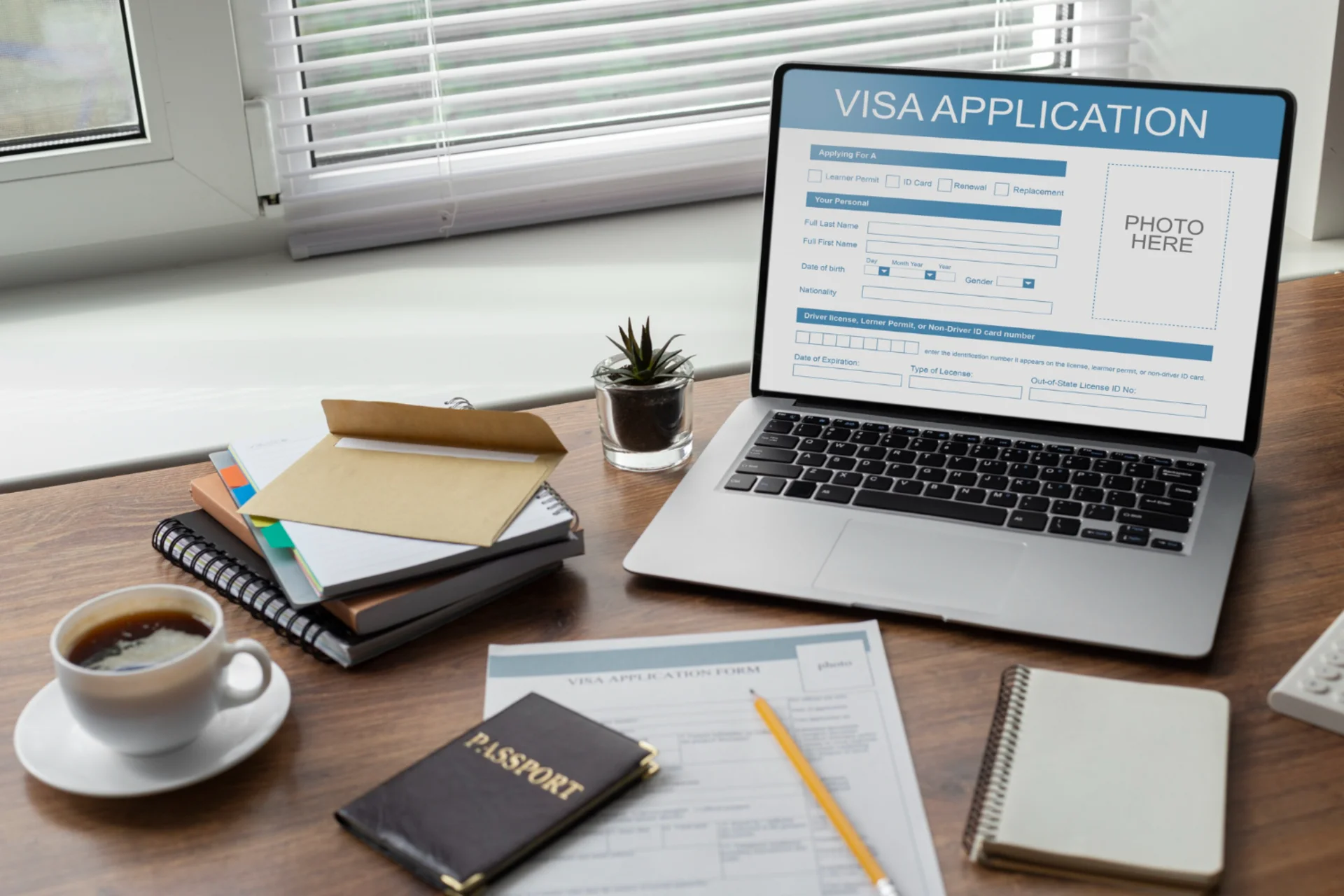 visa application form with passport and documents on desk representing step-by-step arrival process for Thailand visa-free entry for Indians