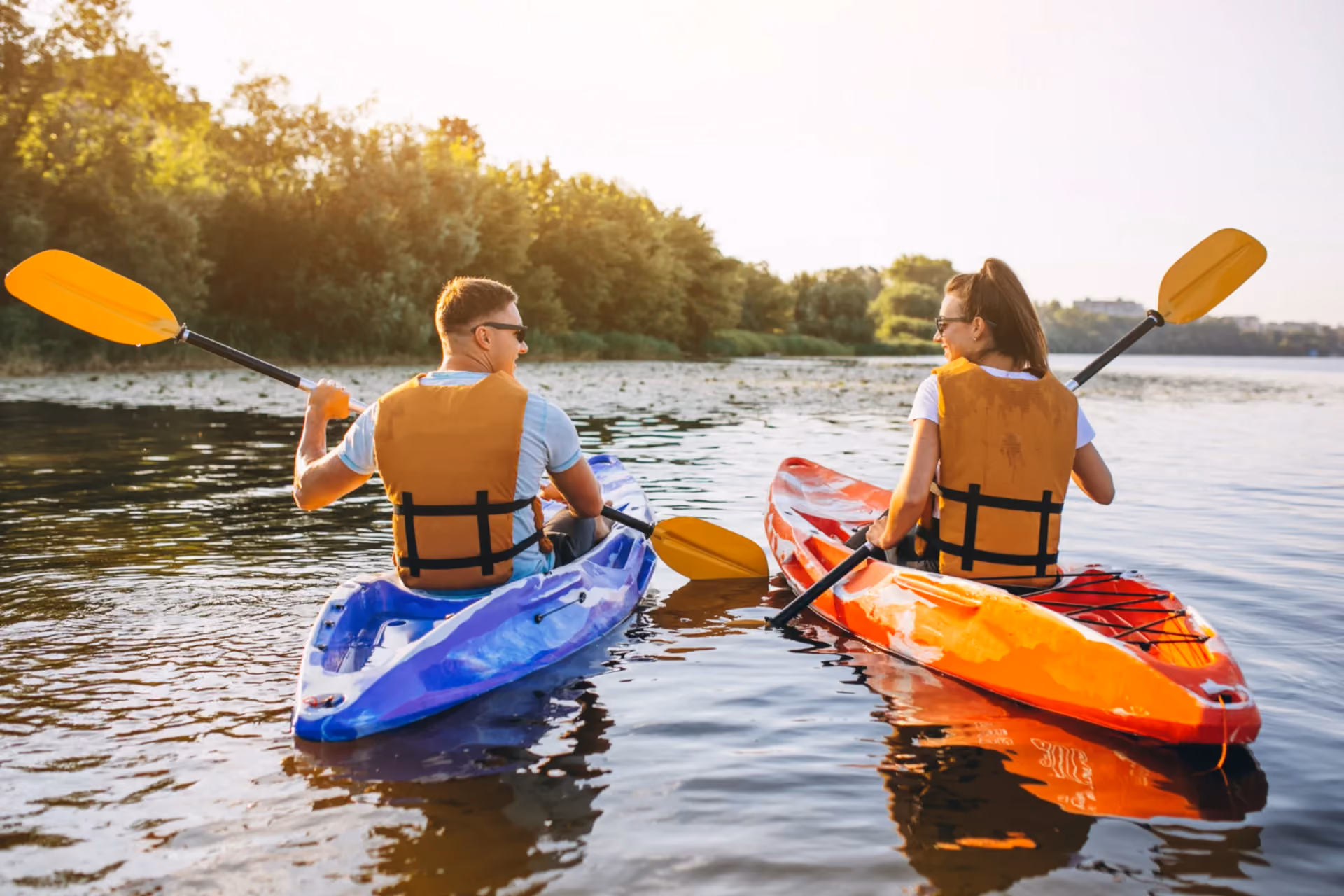Laos vs Thailand budget activities comparison - kayaking and outdoor adventures affordable Southeast Asia travel