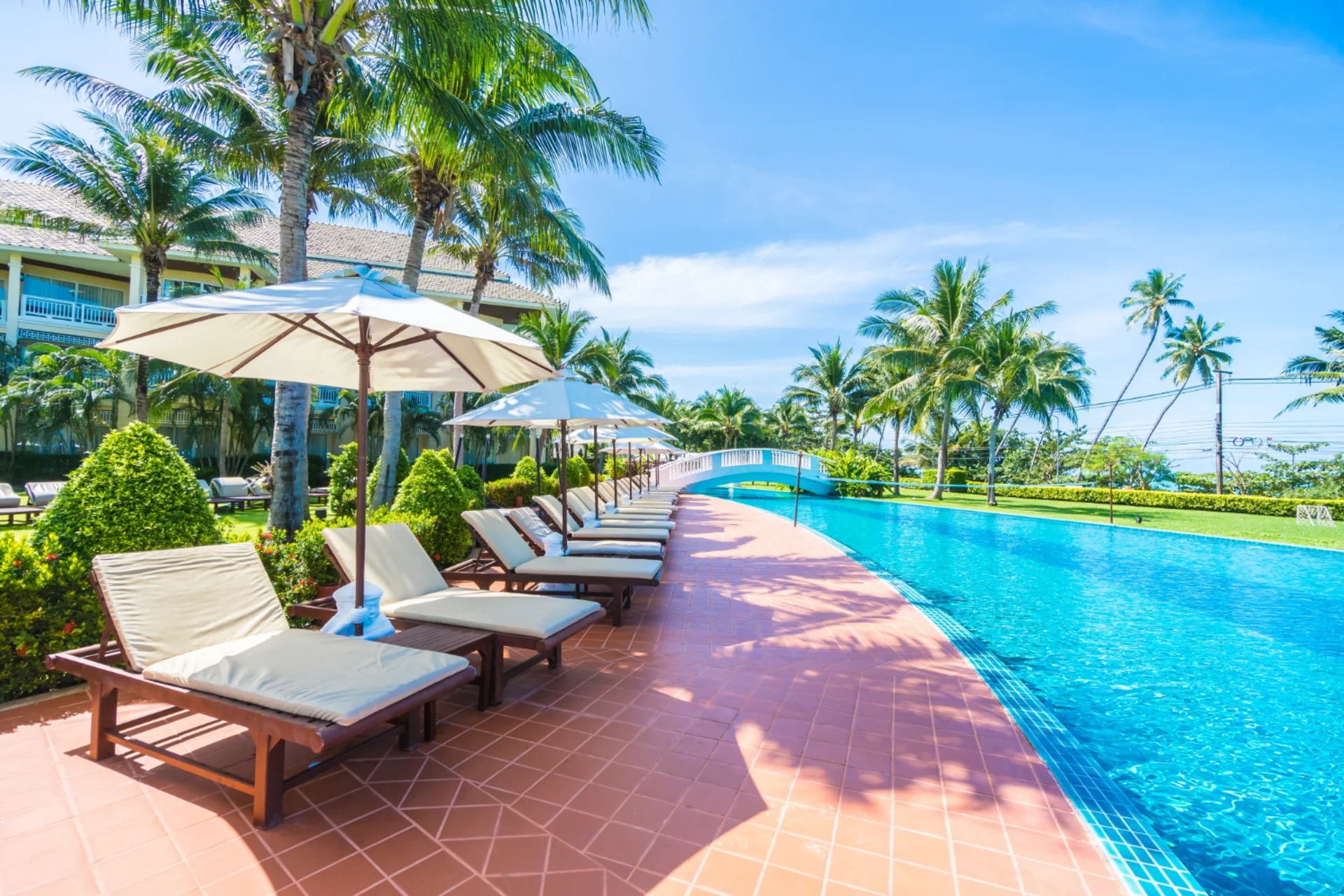 Lounge by pristine infinity pools at Da Nang and Phu Quoc — Vietnam's beach resorts offer scenic leisure at every turn.