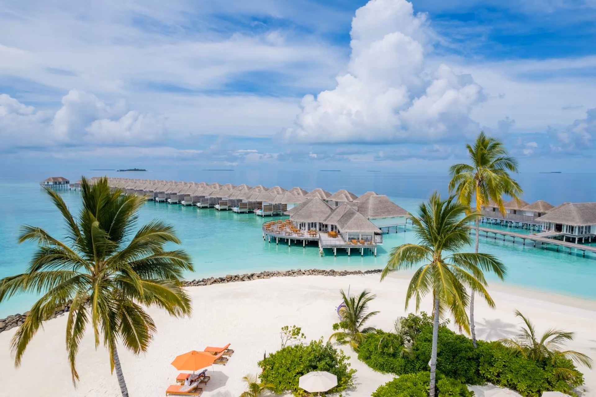 Sun Siyam Iru Veli represents the Maldives stay style—private villas over crystal waters where the entire experience revolves around resort luxury and exclusivity.