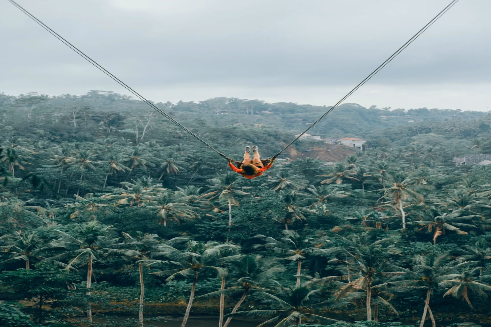 The famous Bali Swing over Ubud's jungle canopy — an experience that feels wild and intimate, yet draws queues by mid-morning. In the Bali vs Thailand debate for couples who hate crowds