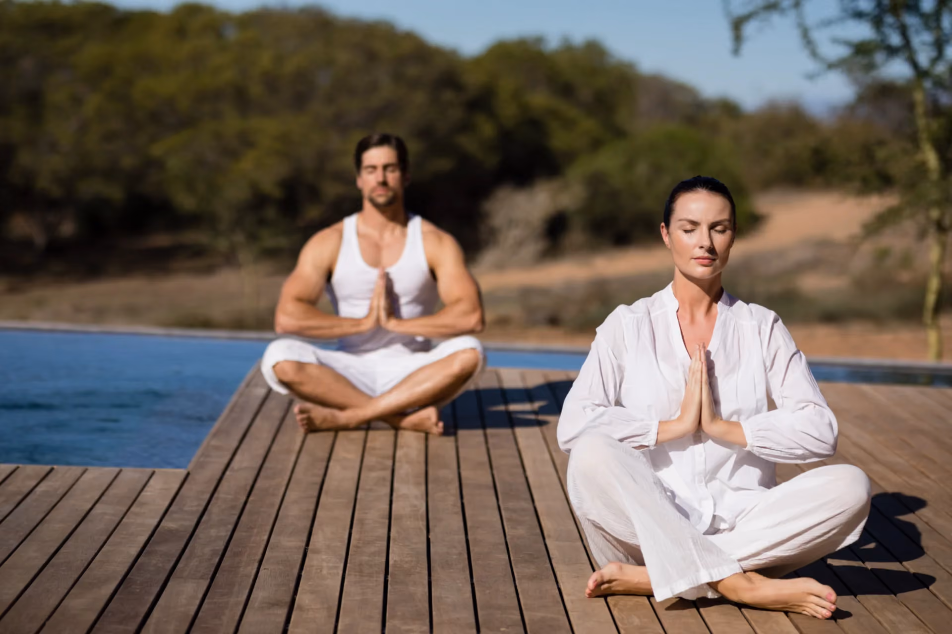 Meditation retreats in Thailand and Laos — couples finding stillness and spiritual calm at serene outdoor wellness retreats