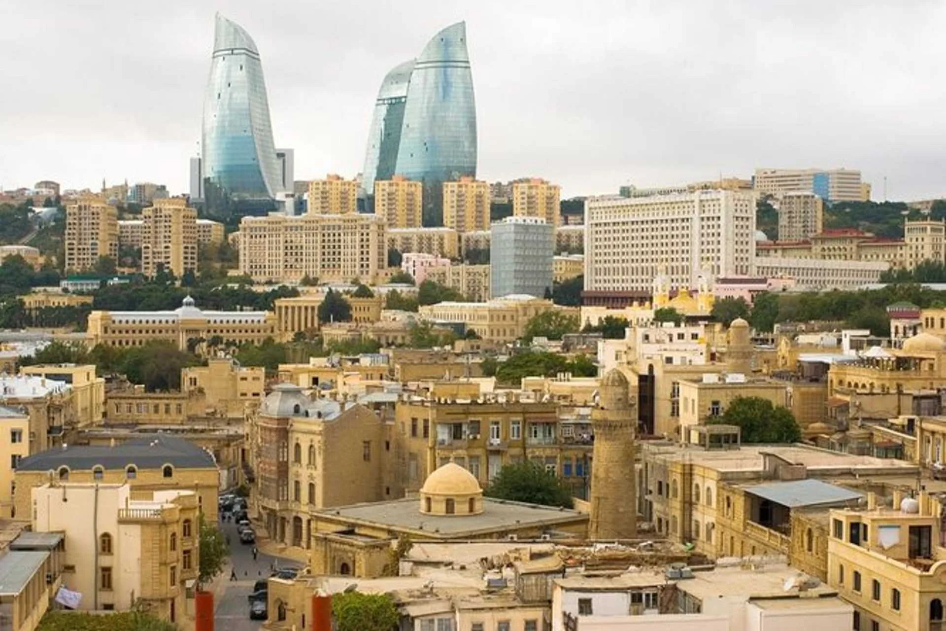 Baku Old City Icherisheher with historic walls and modern skyline, Azerbaijan vs Kazakhstan