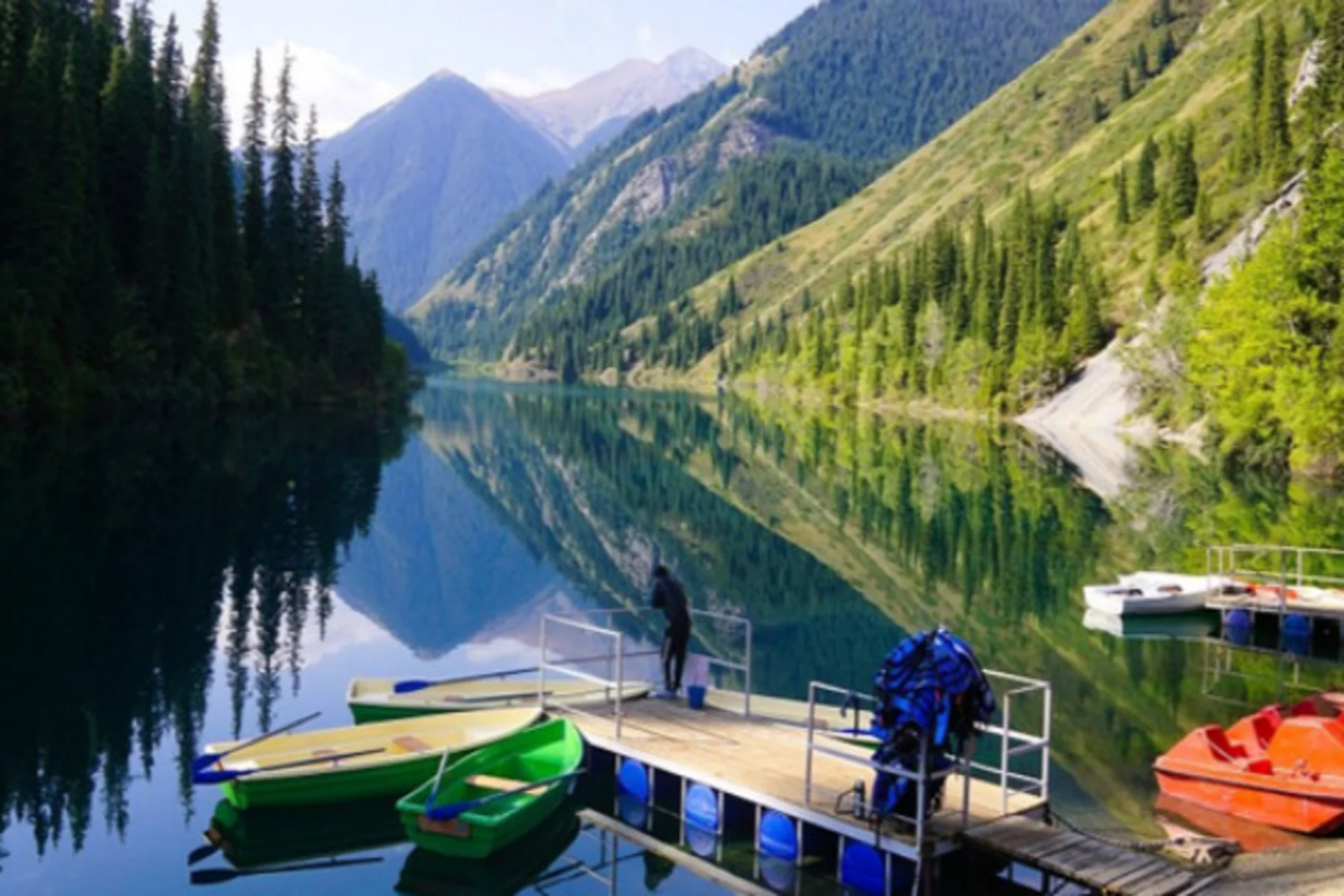 Kazakhstan's natural lakes offer peaceful boating and lakeside relaxation away from tourist crowds.