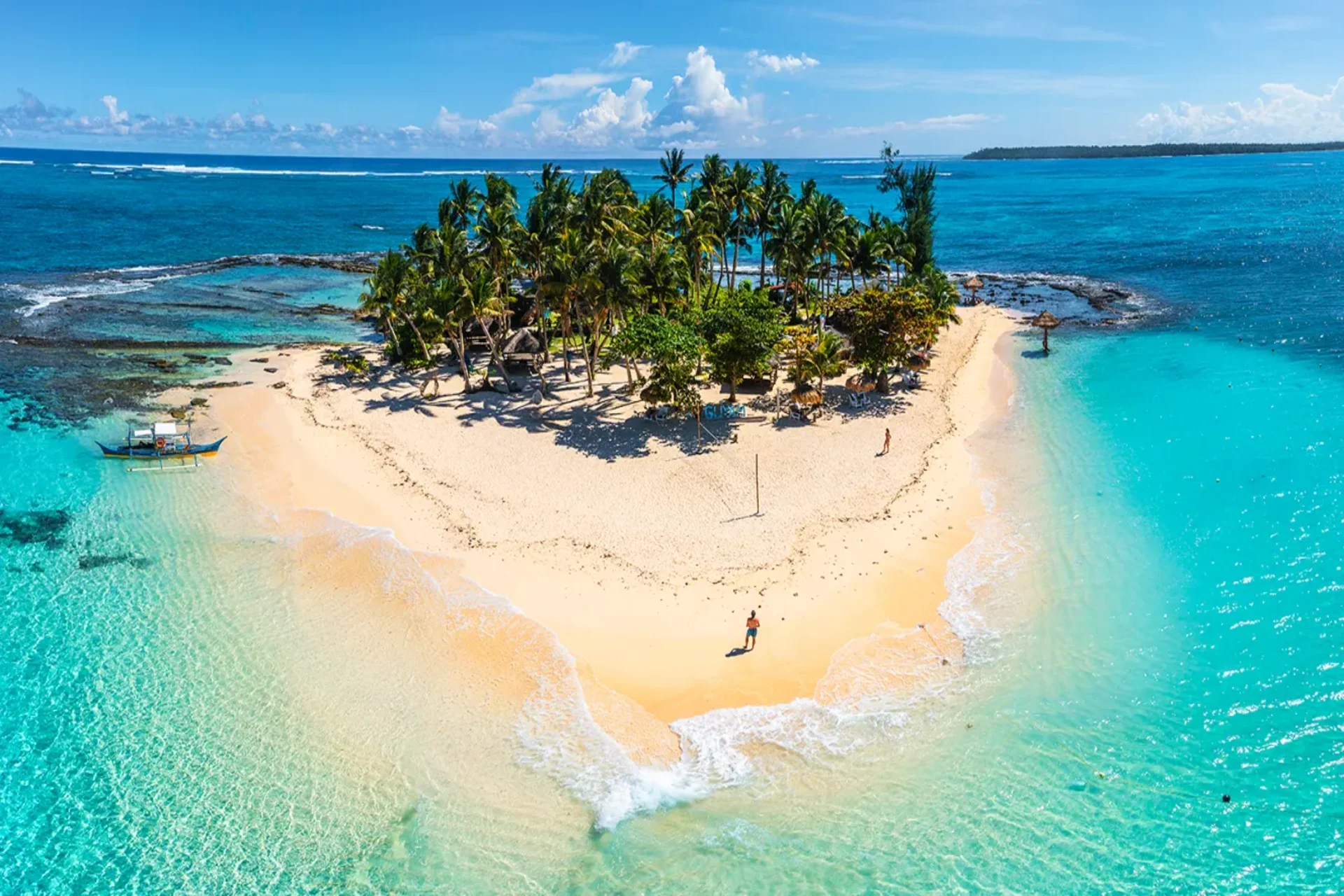 White sand beach and turquoise sea in the Philippines – best beach destination to visit in May