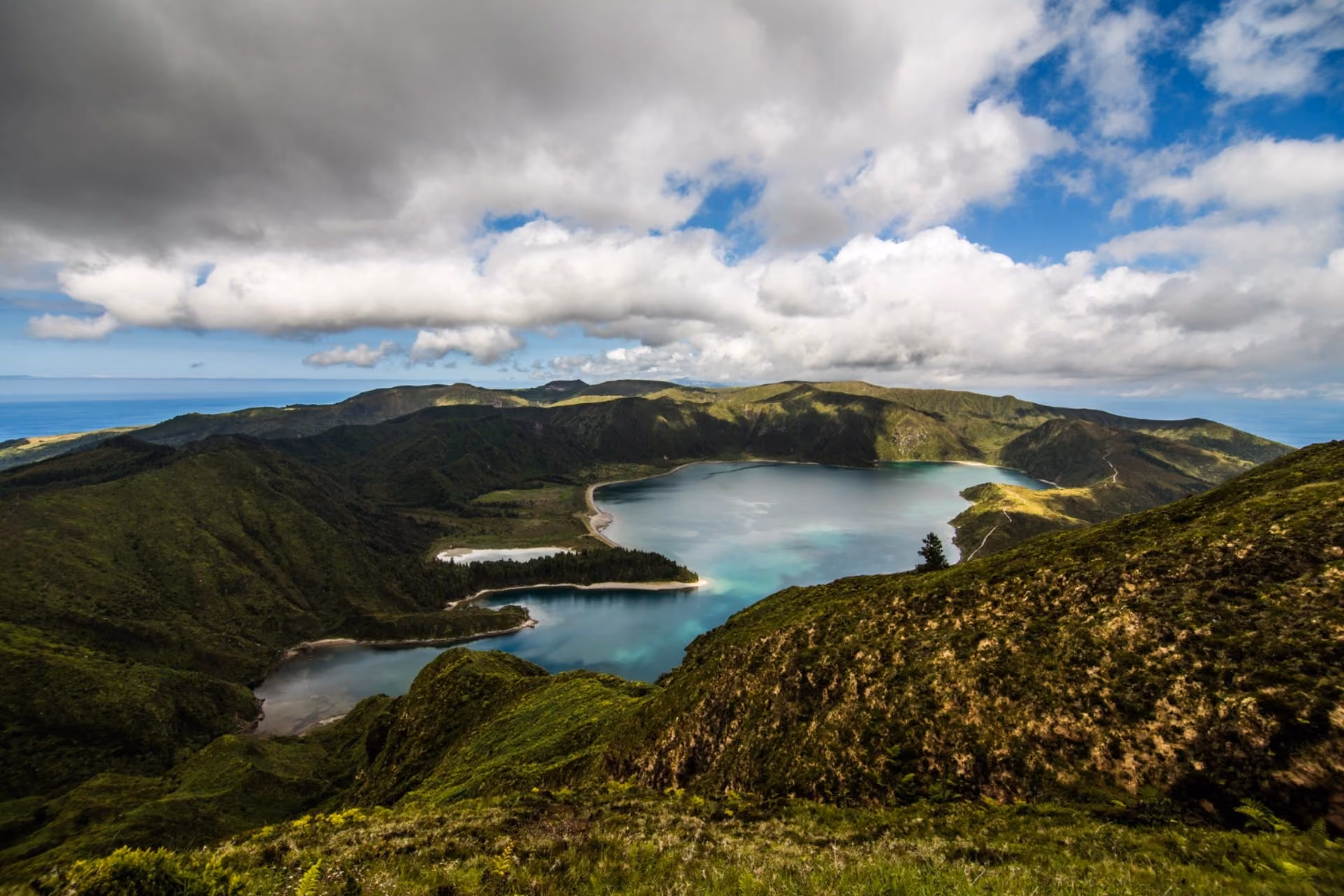 Turquoise volcanic crater lake with green mountain valleys – Vietnam vs New Zealand nature in June