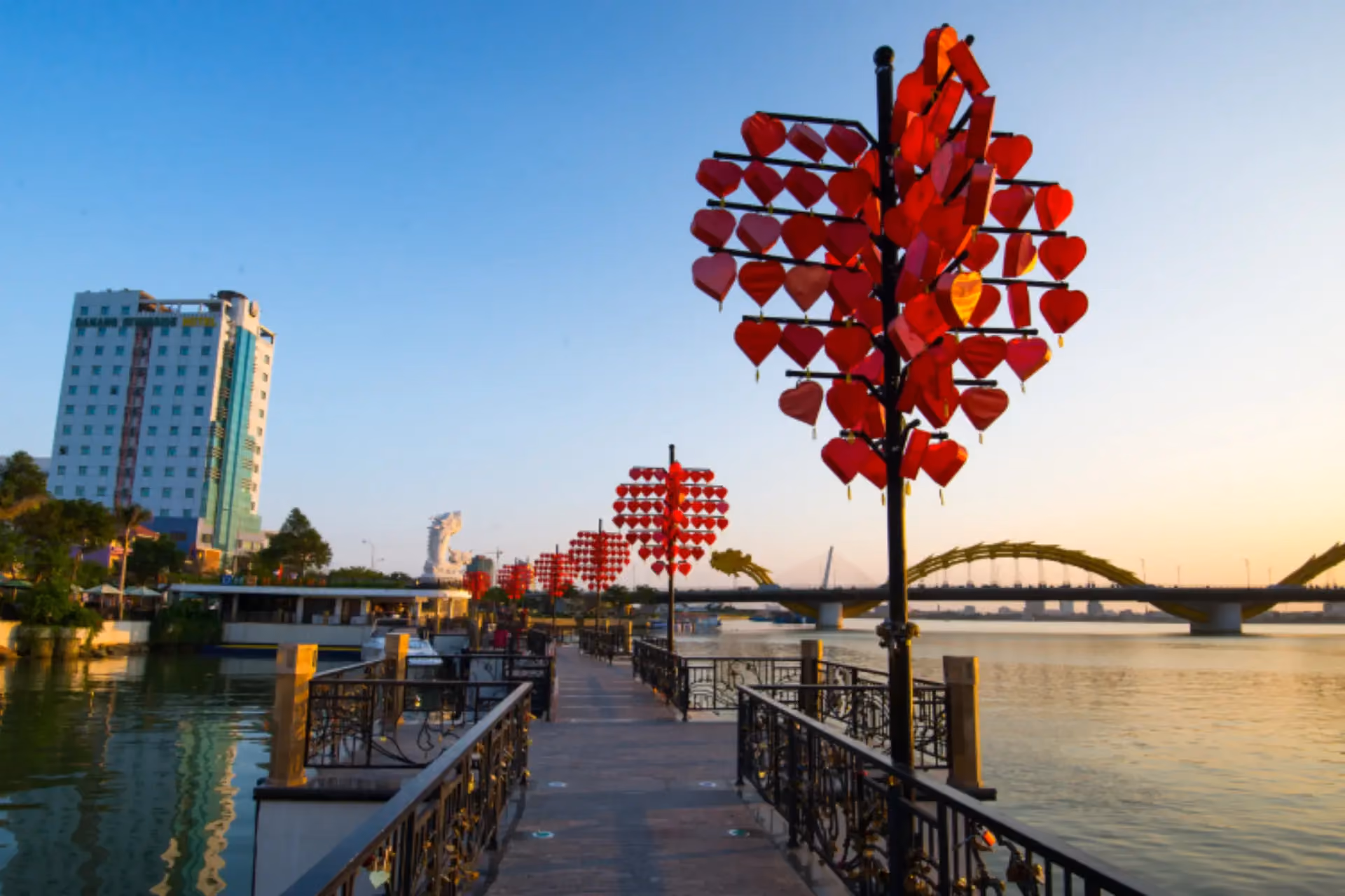 Red heart decorations on pole at Da Nang bridge