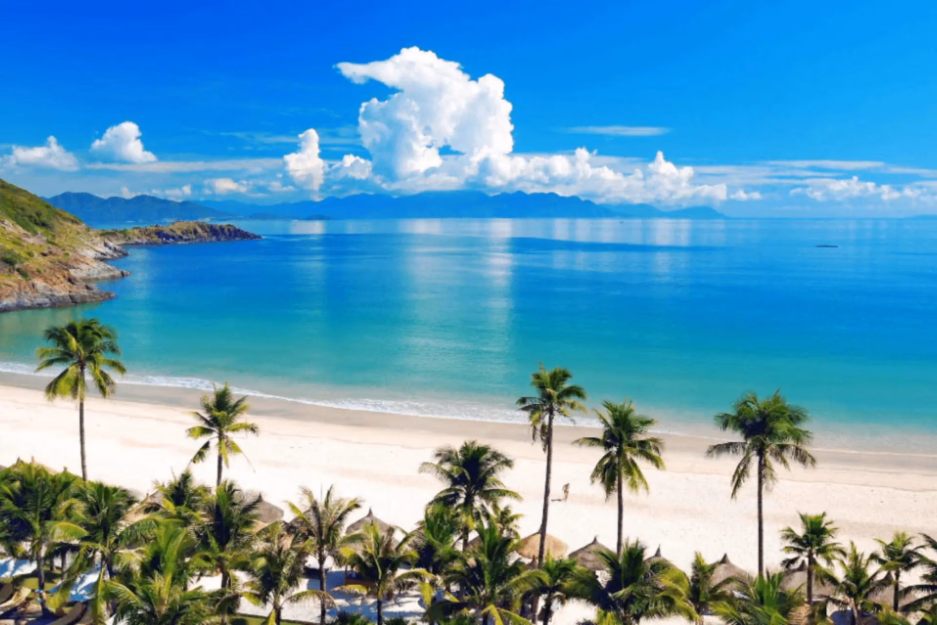 My Khe Beach with white sand and palm trees