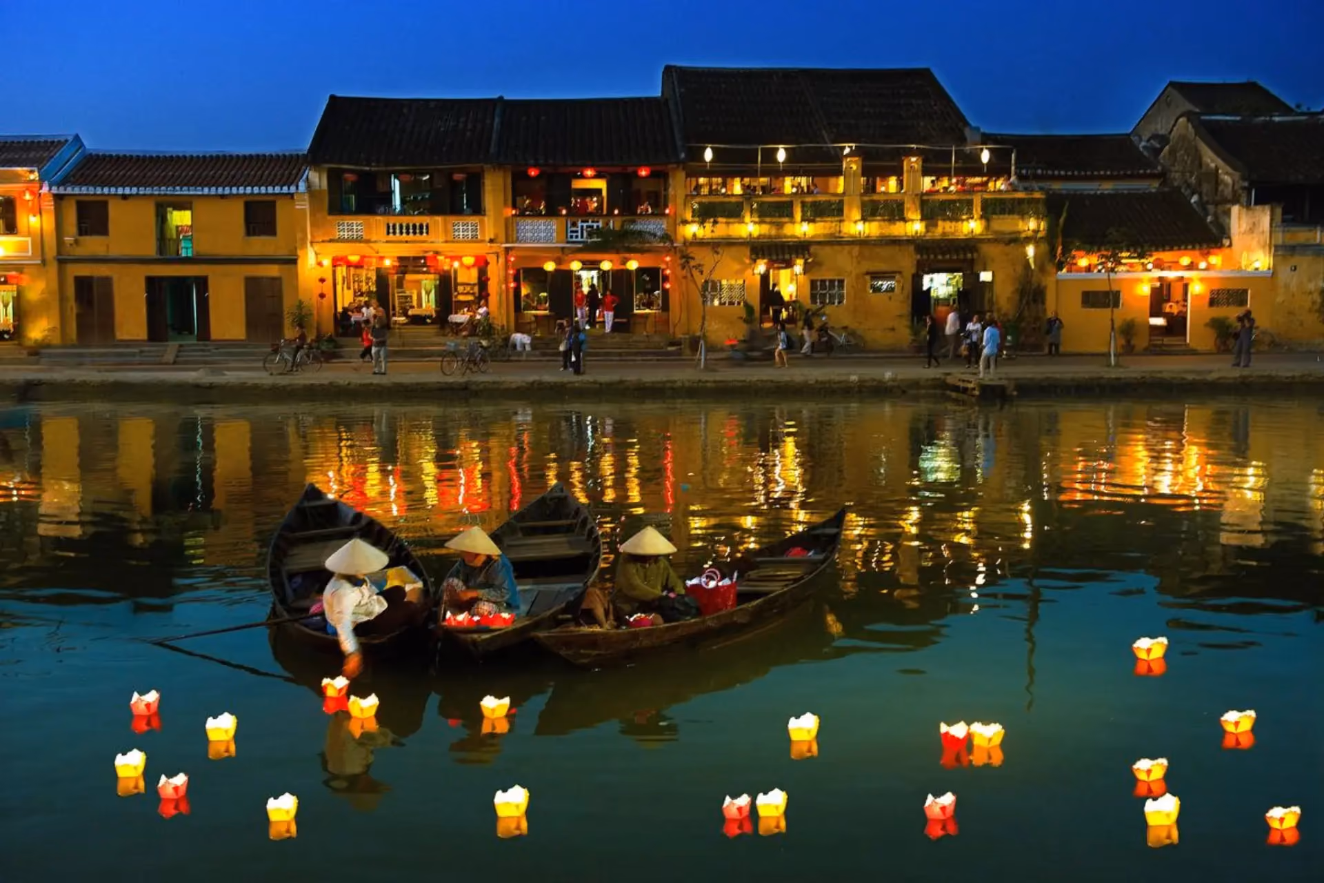 Floating lanterns on water in Hoi An Vietnam at night