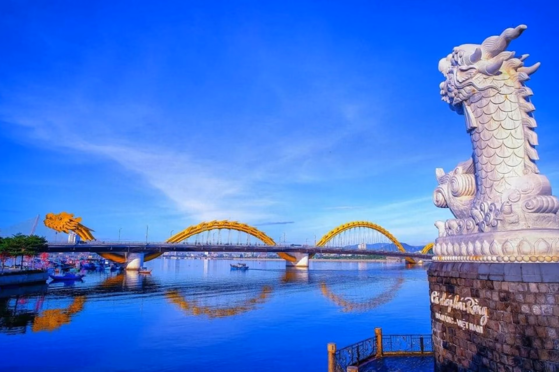 Dragon statue and golden bridge at Da Nang Vietnam
