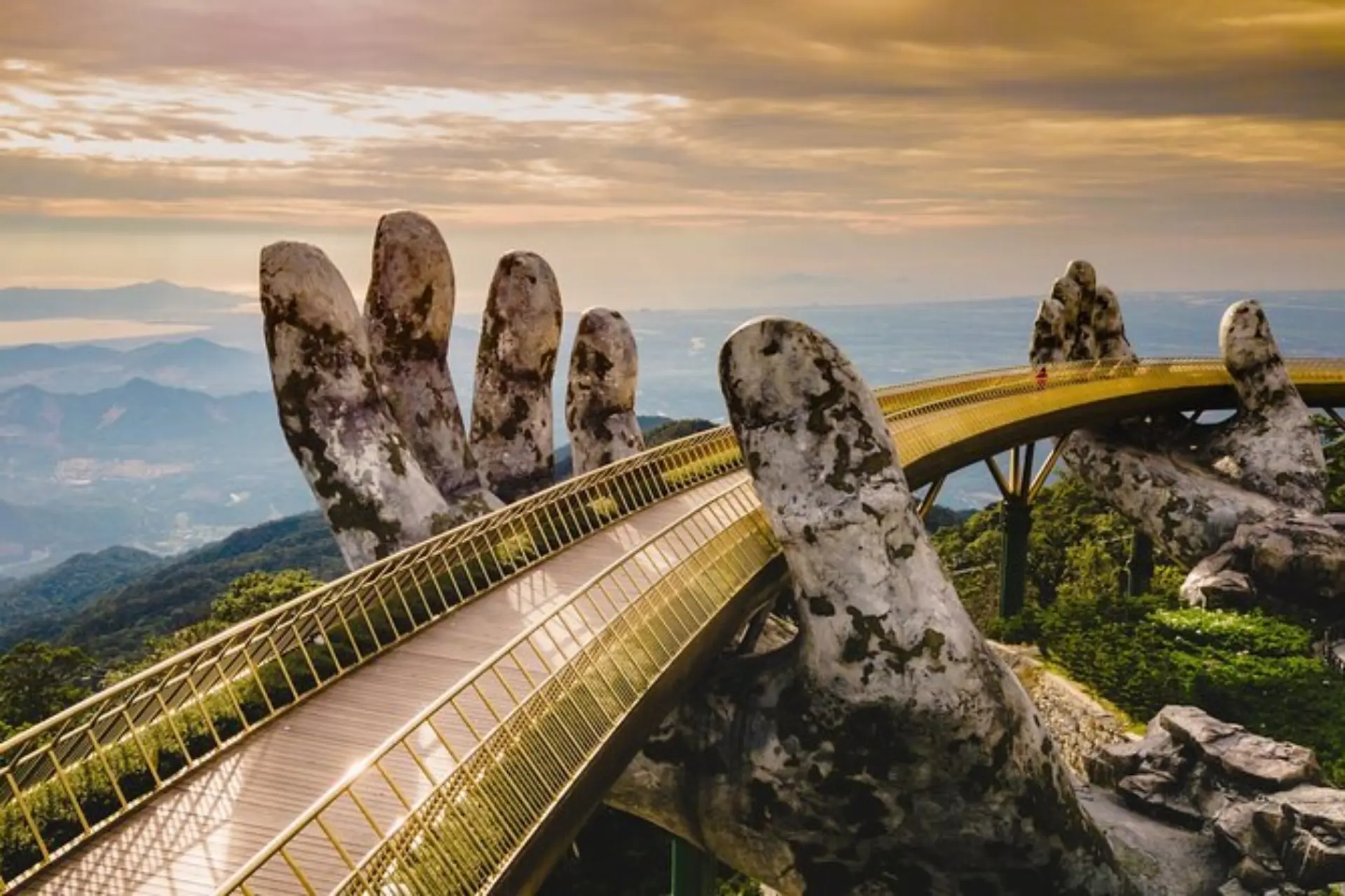 Stone hands holding Golden Bridge Da Nang Vietnam