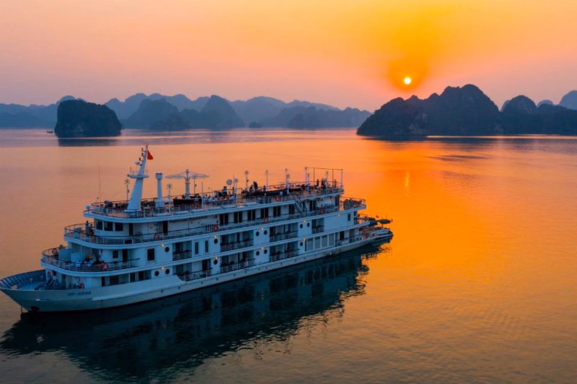 Cruise ship at sunrise in Halong Bay Vietnam