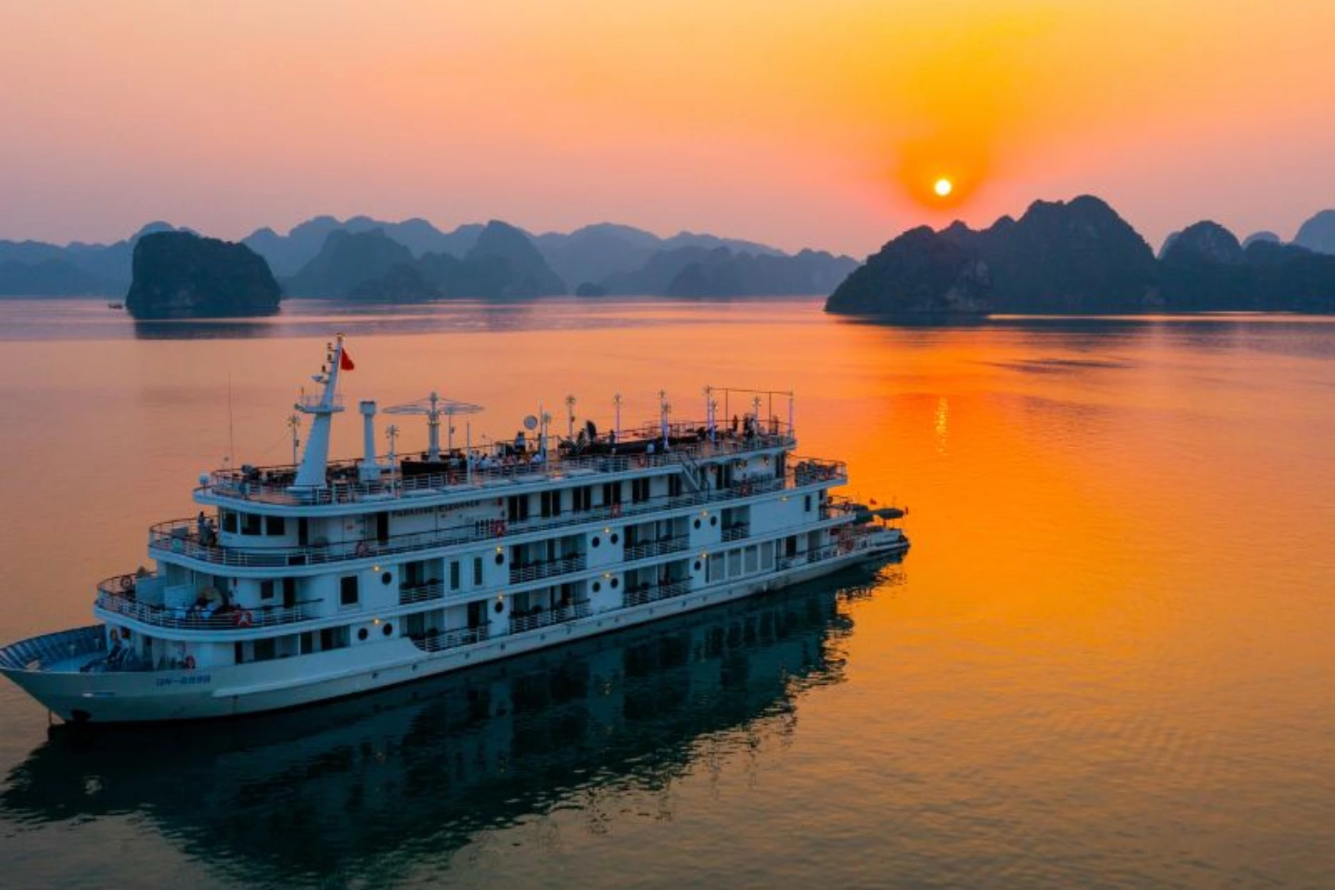 Cruise ship at sunrise in Halong Bay Vietnam