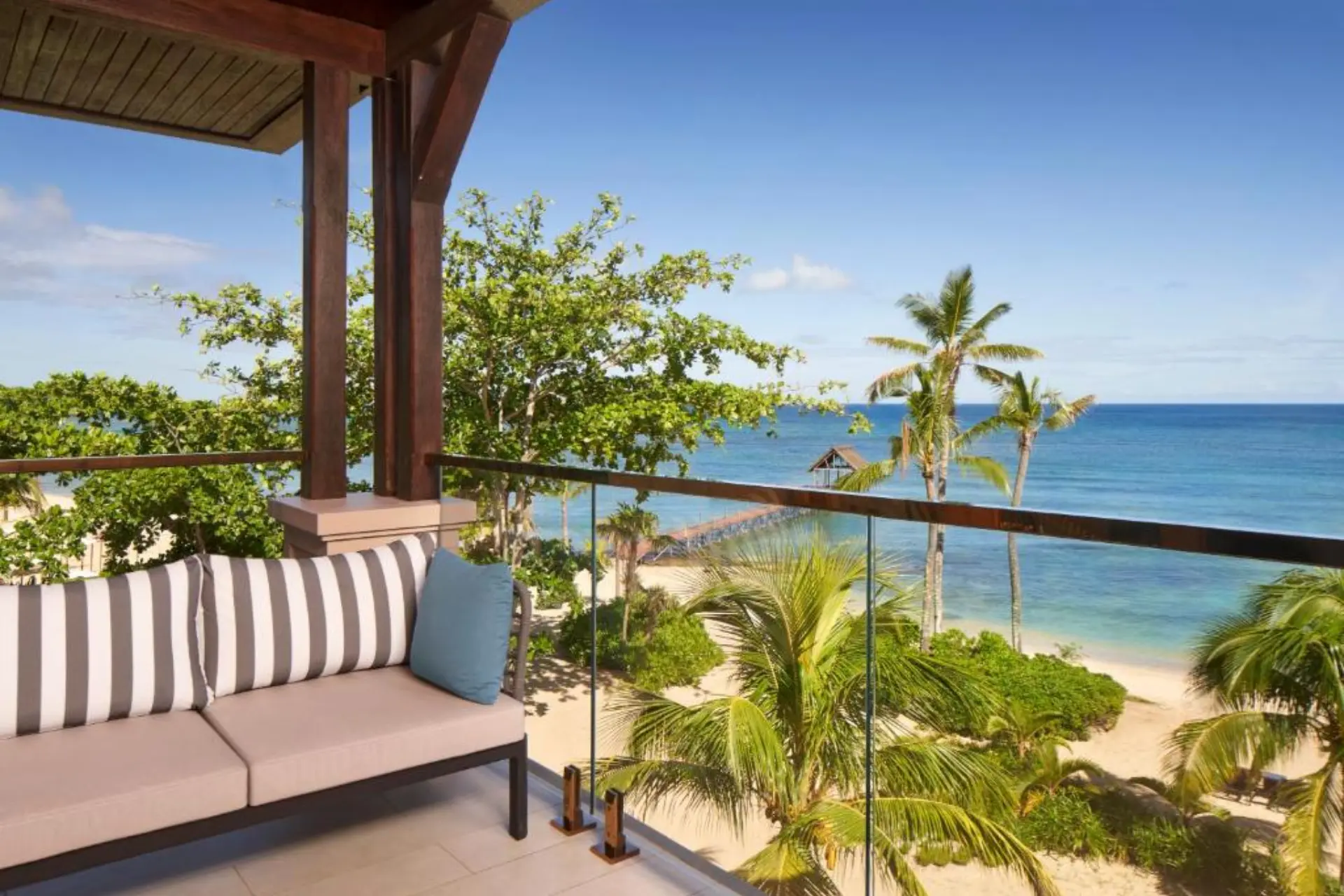 Covered balcony overlooking beach at Le Meridien Mauritius