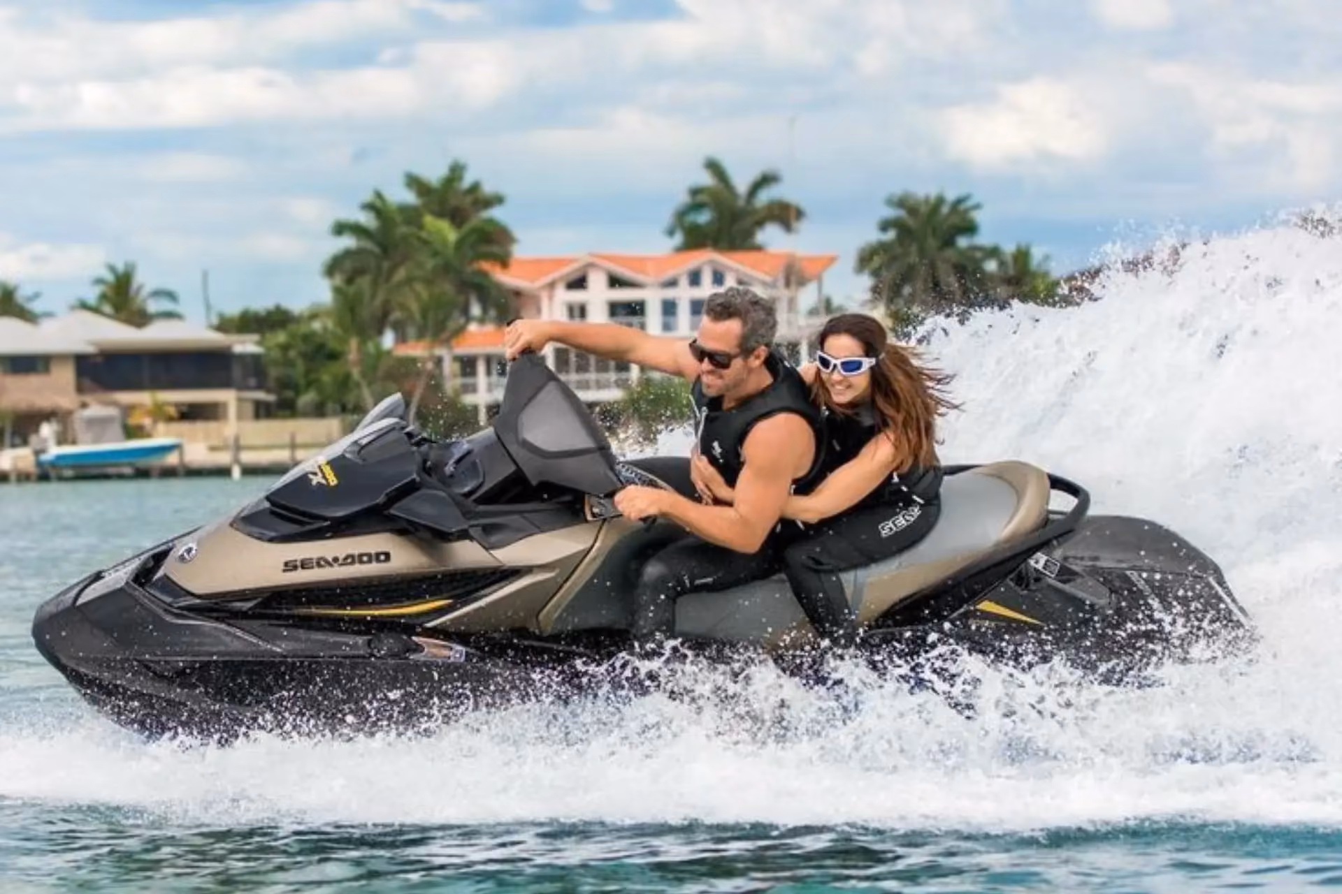 Two people on jet ski in ocean waves, Queenstown