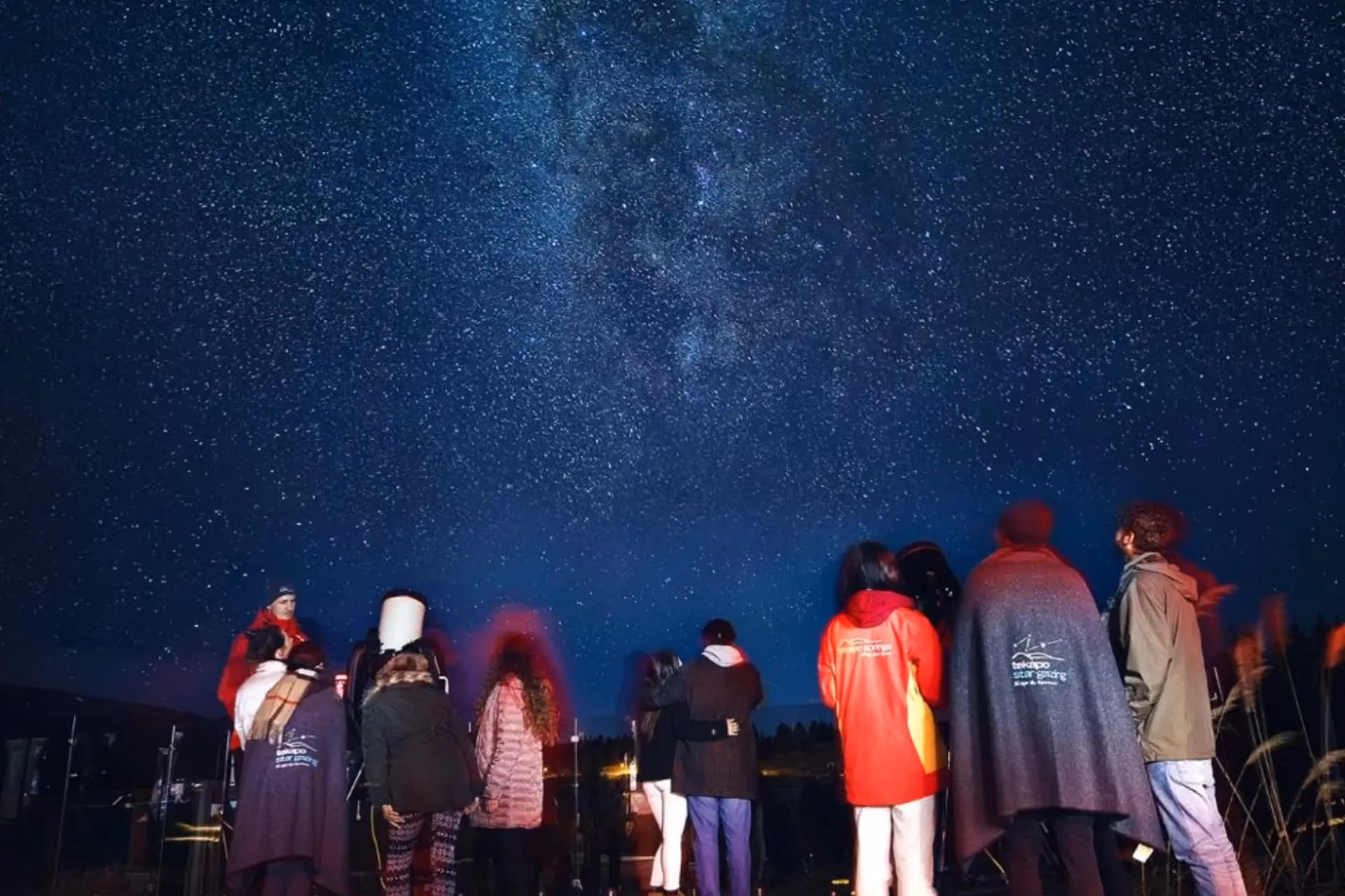 Group watching stars and Milky Way at Lake Tekapo