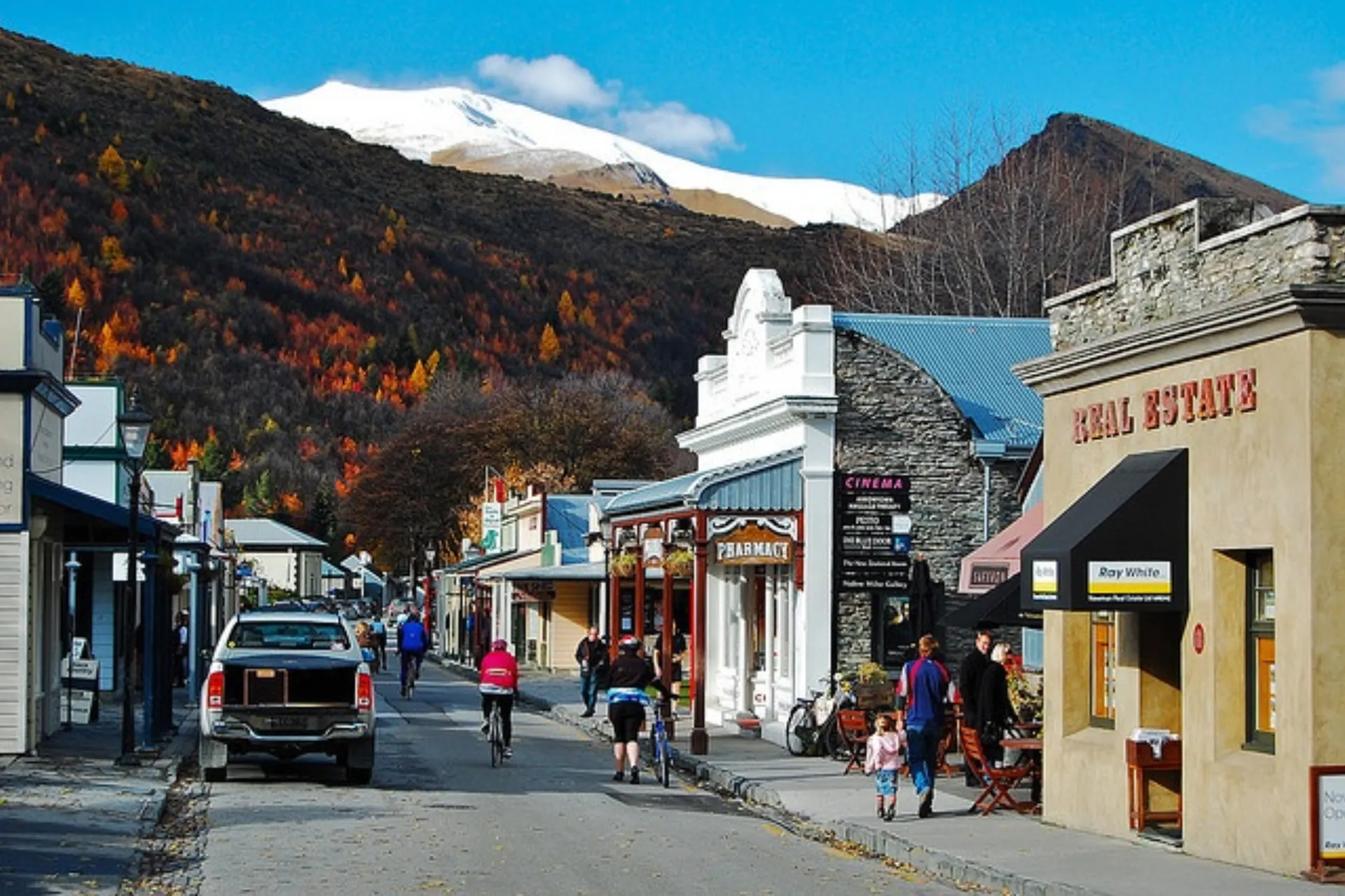Arrowtown main street with snow-capped mountain behind