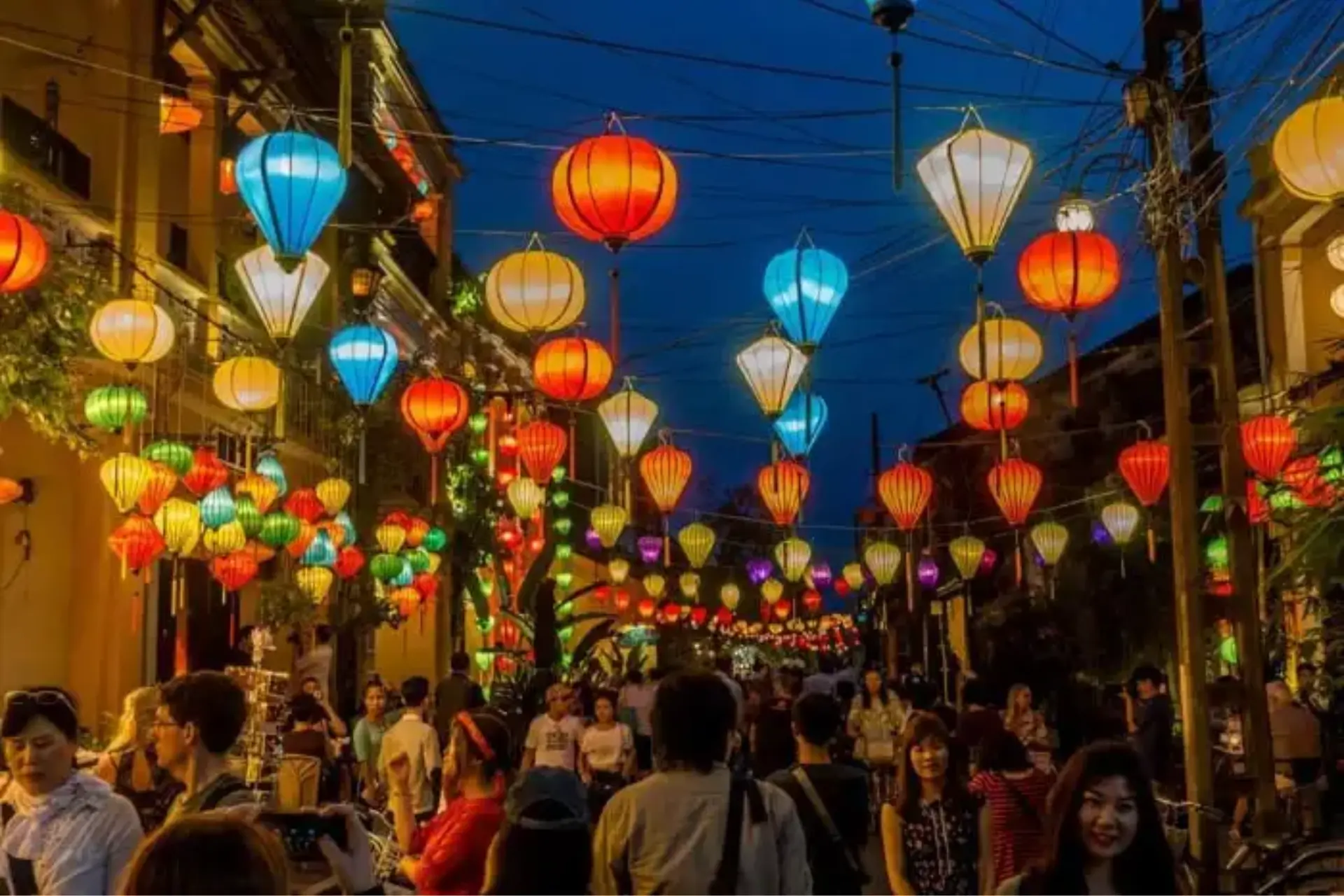 Colorful lanterns lighting up street in Hoi An Town at night