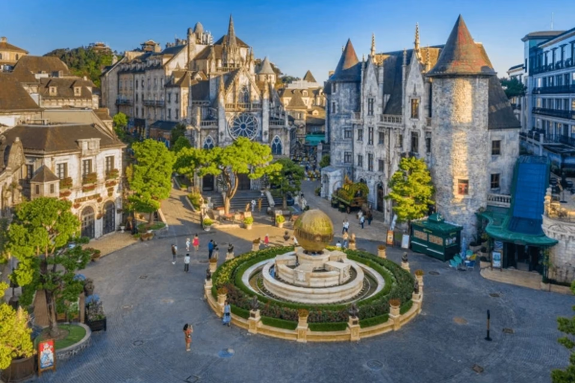 French Village square in Hanoi with stone tower and church