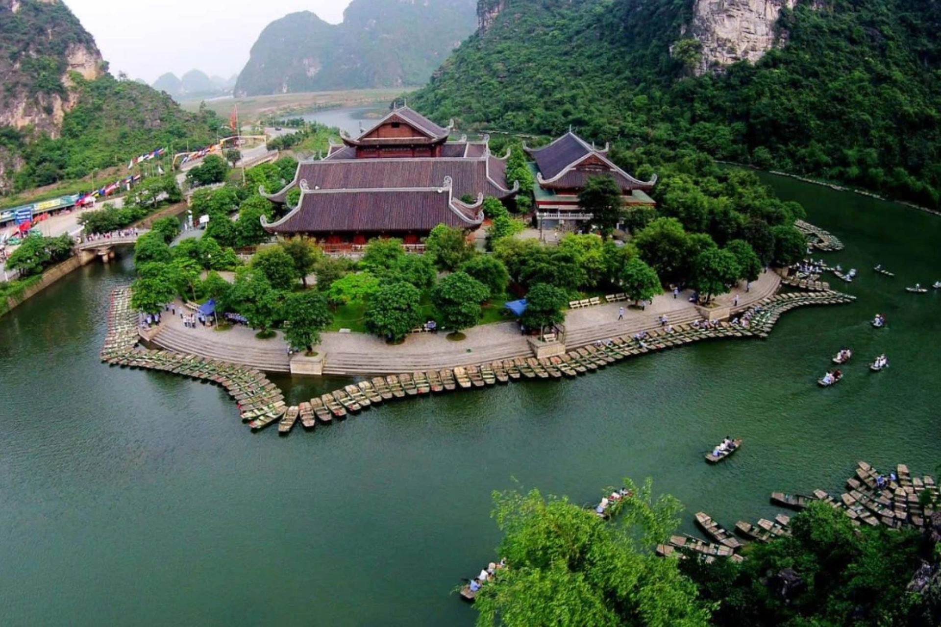 Traditional temple on island in Trang An river Vietnam