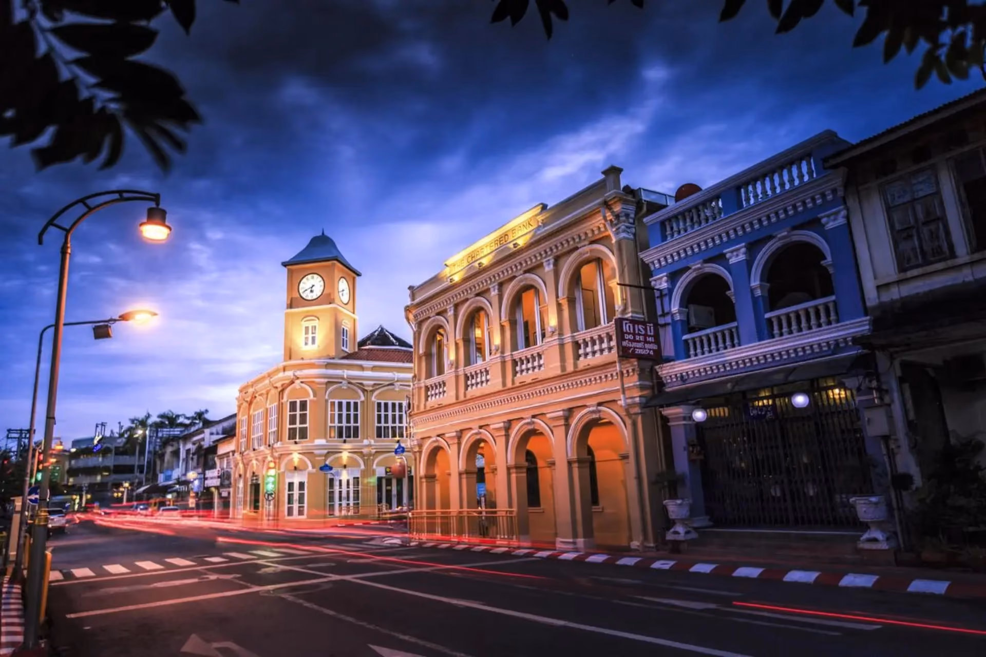 Thailand Old Town street with clock tower at dusk
