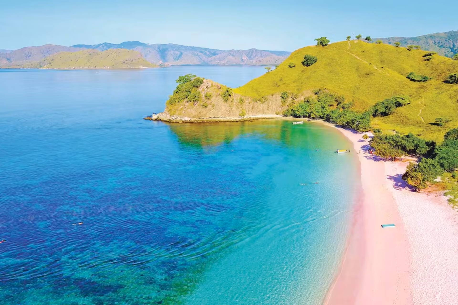 Pink sand beach and blue water at Lombok