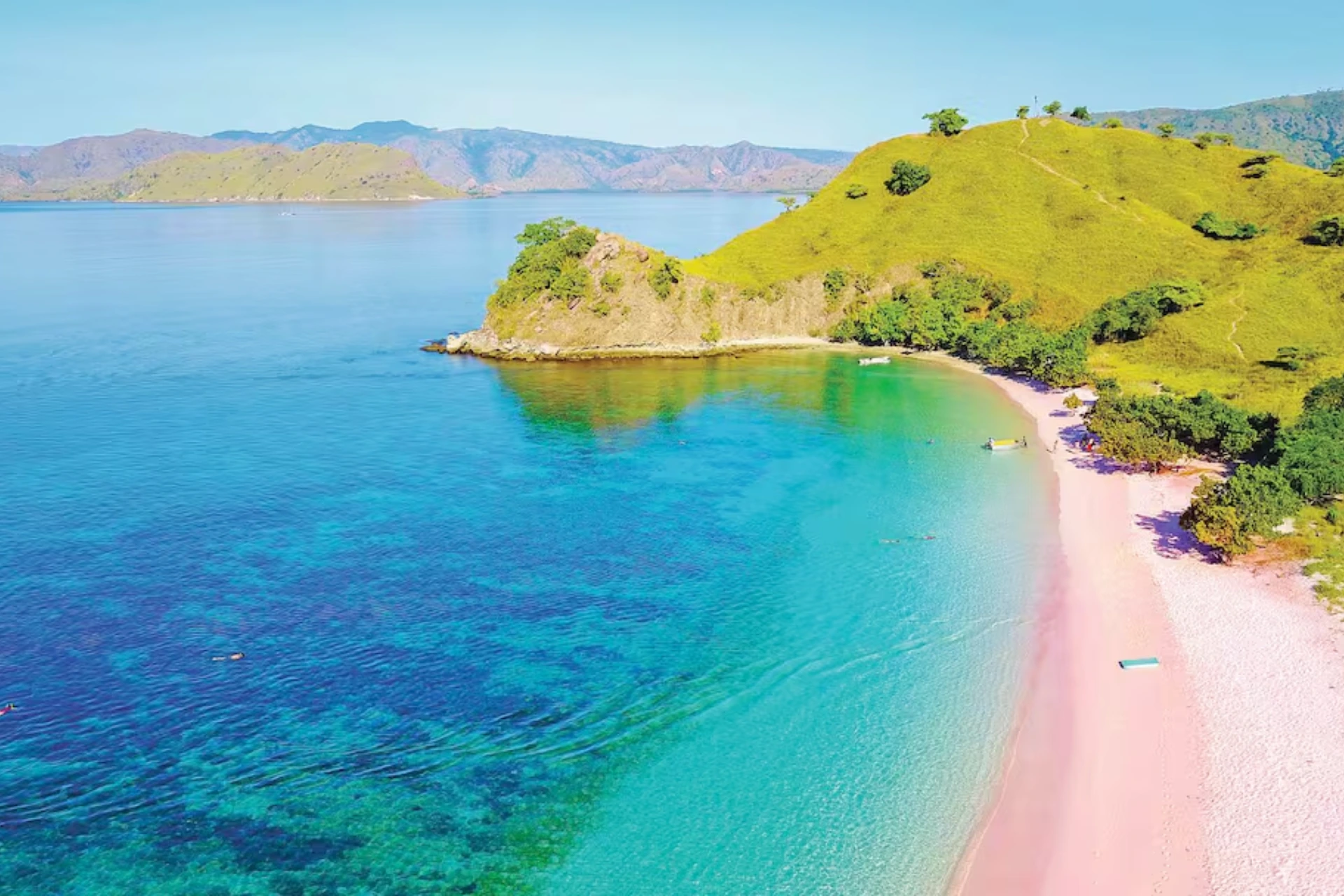 Pink sand beach and blue water at Lombok