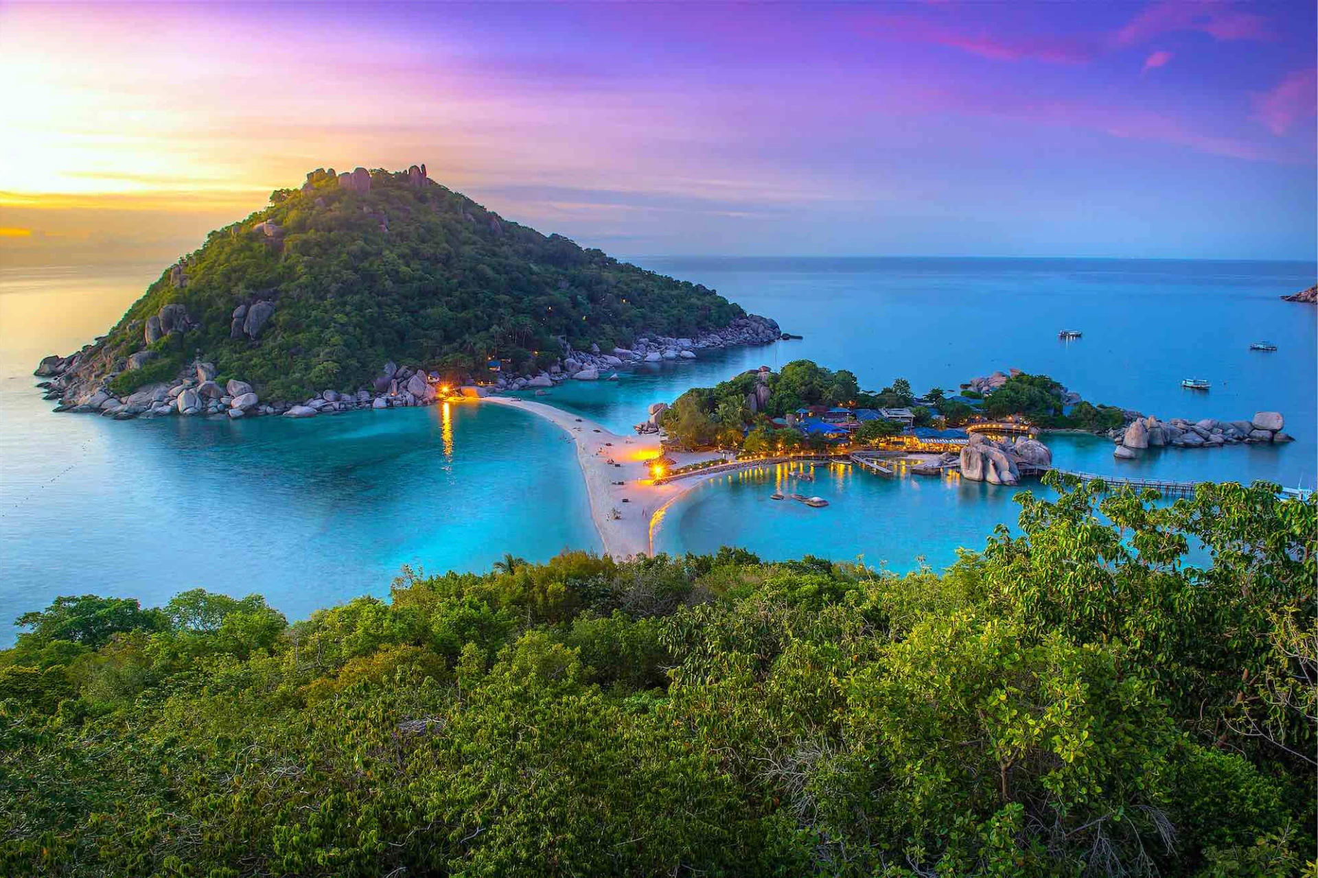 Sunset view of rocky island and beach at Koh Tao Thailand