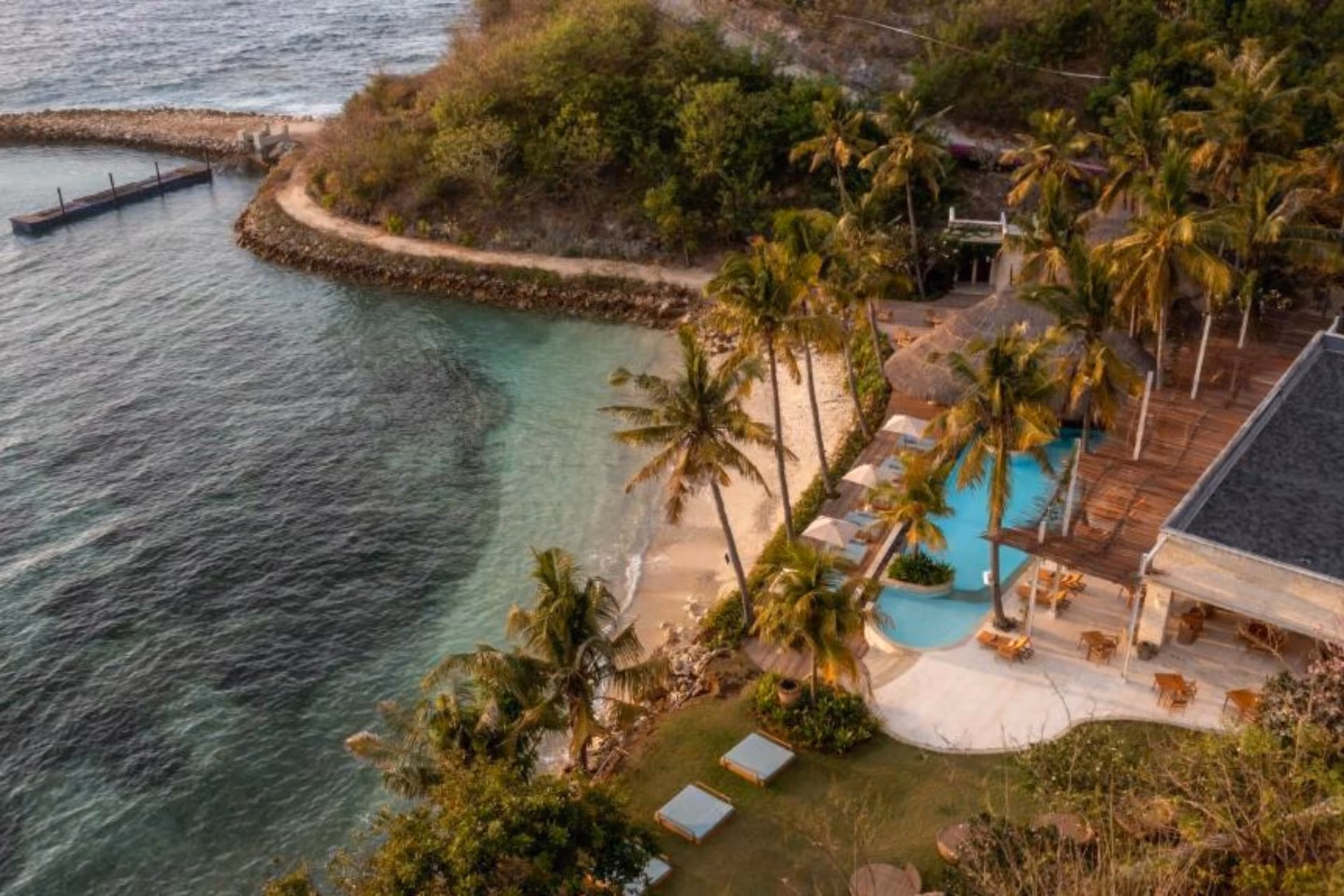 Semaya Beach with pool, palm trees, and calm water