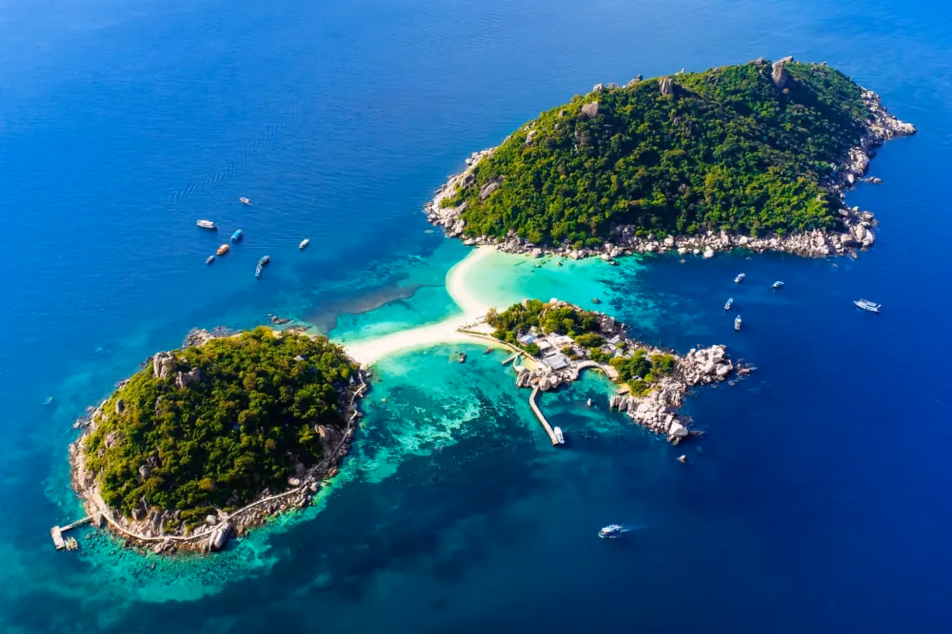 Koh Tao island with white sand beach and blue-green water