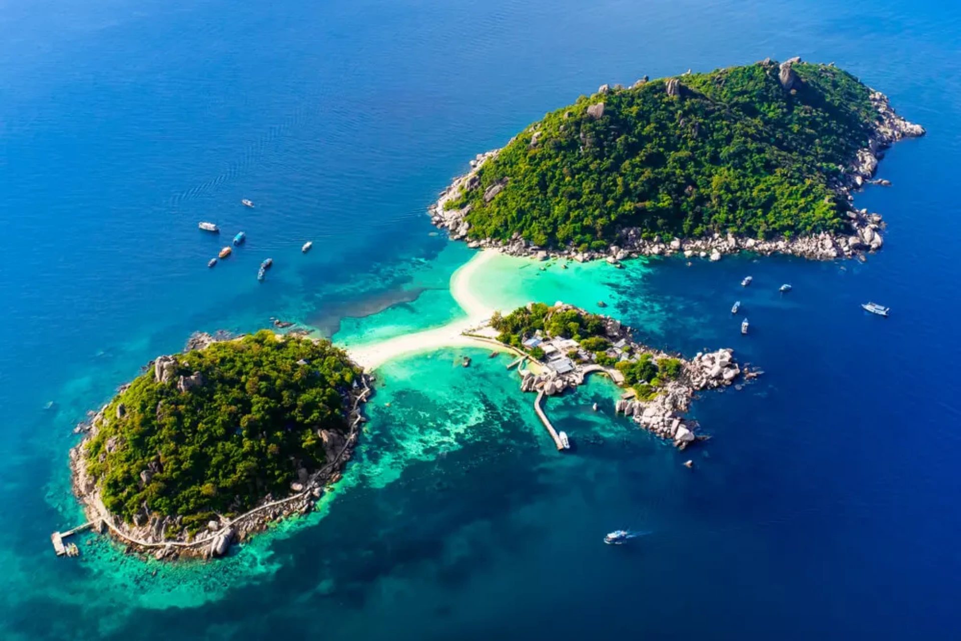 Koh Tao island with white sand beach and blue-green water