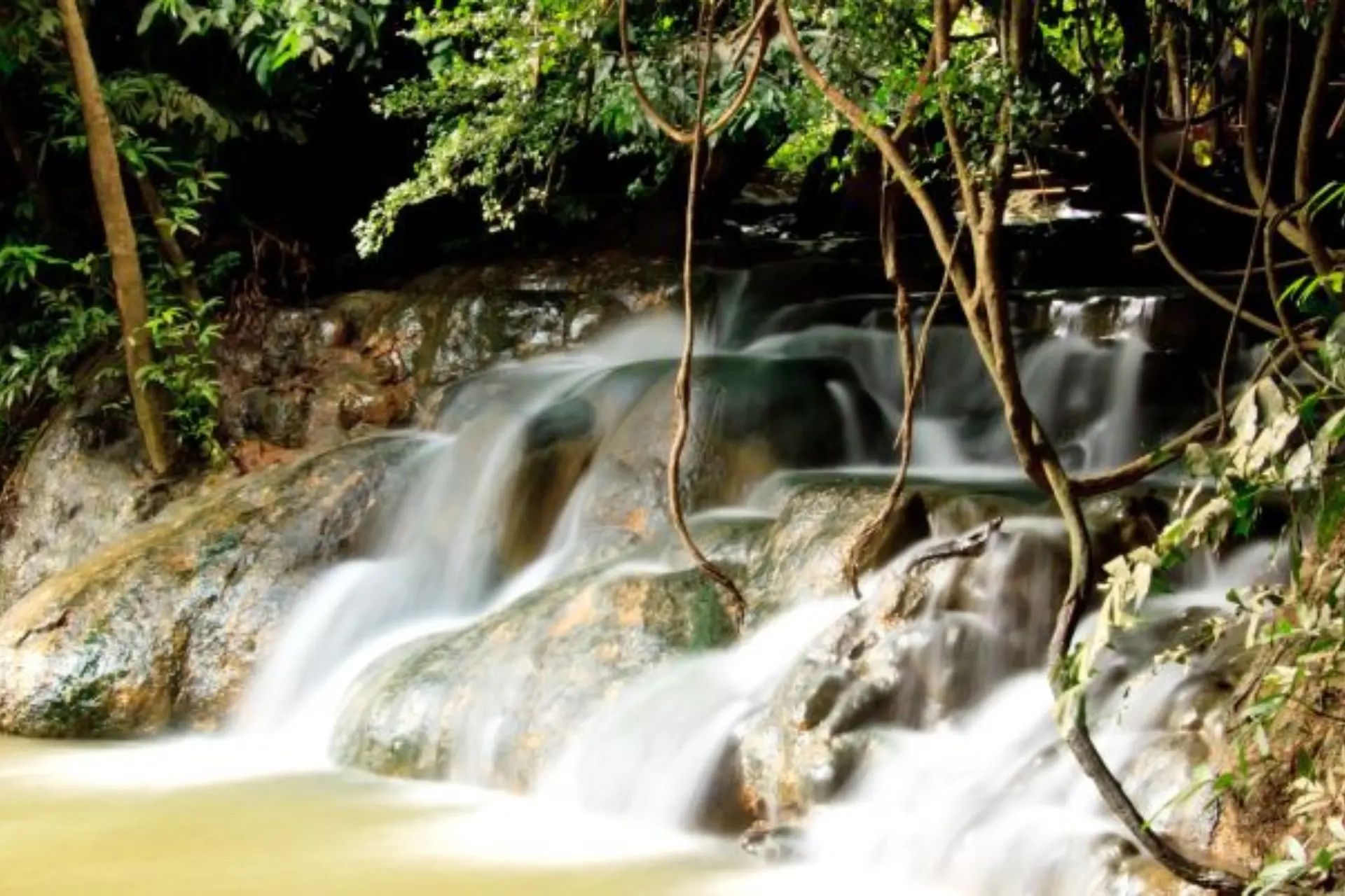 Cascading waterfall and pools at Hot Springs Krabi