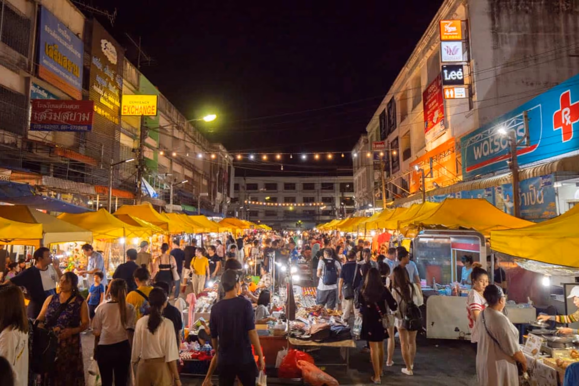 Busy night market in Krabi Town with yellow tents