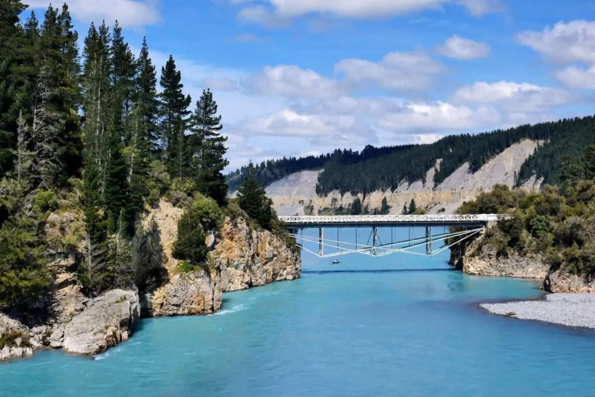 Bridge crossing blue-green river at Rakaia Gorge New Zealand