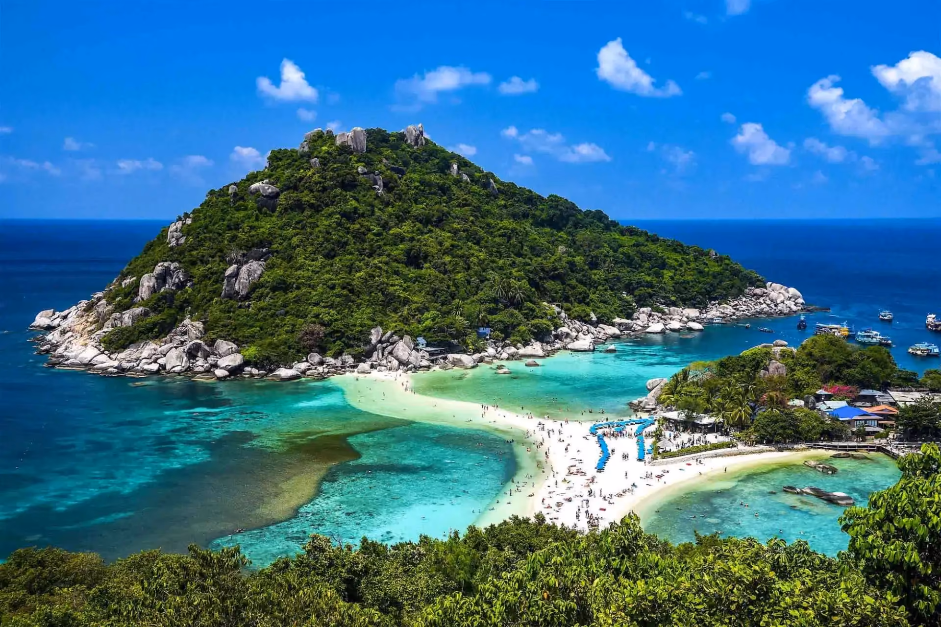 Koh Tao island with sandy beach and clear blue-green water