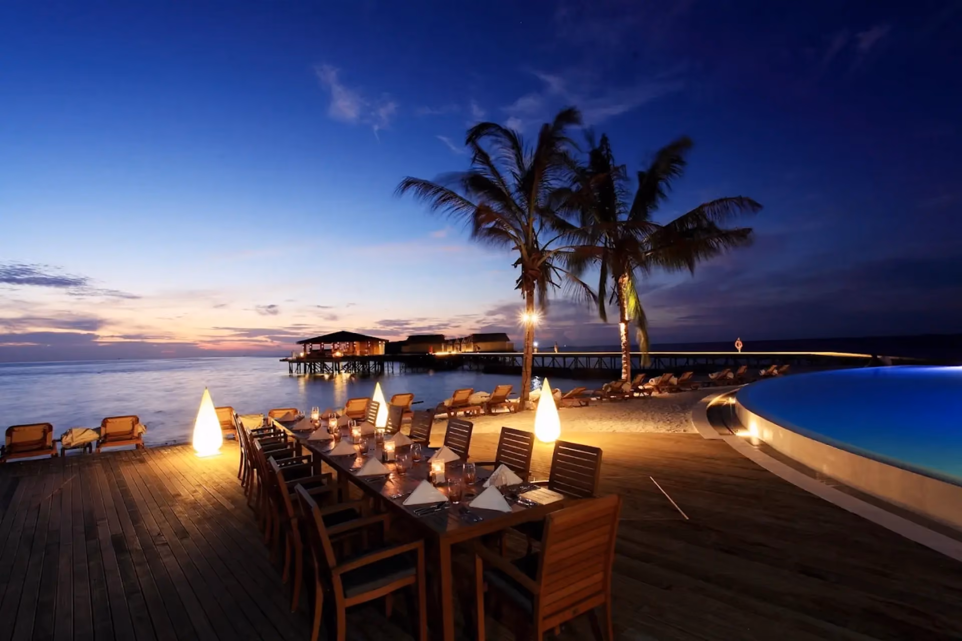 Centara Ras beachside dinner setup at sunset