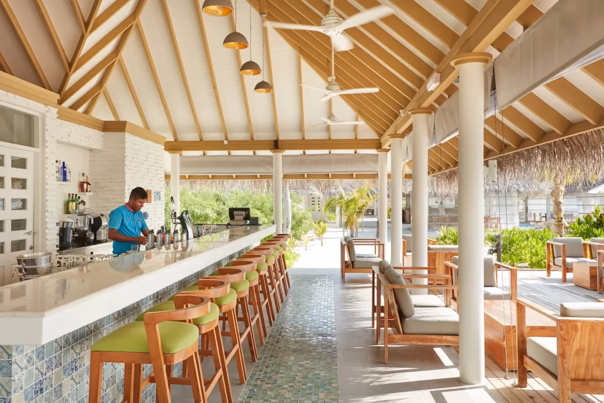 Sun Siyam Iru Veli breakfast bar with wooden beams and seating