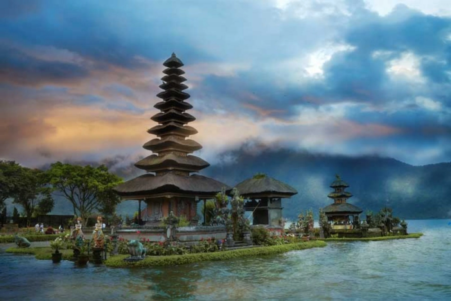 Ulundanu Temple Beratan with tiered roofs on lake and mountains
