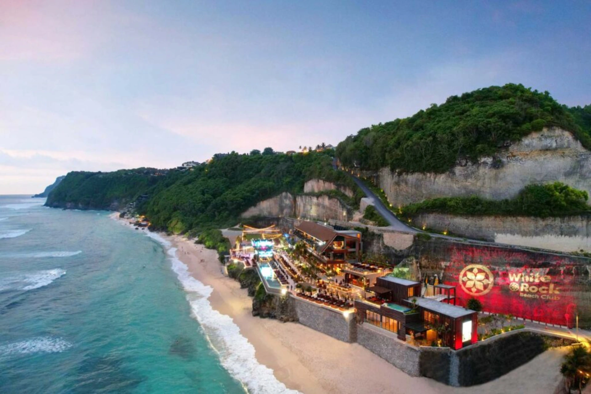Timbis Beach Club nestled on cliffs above sandy beach