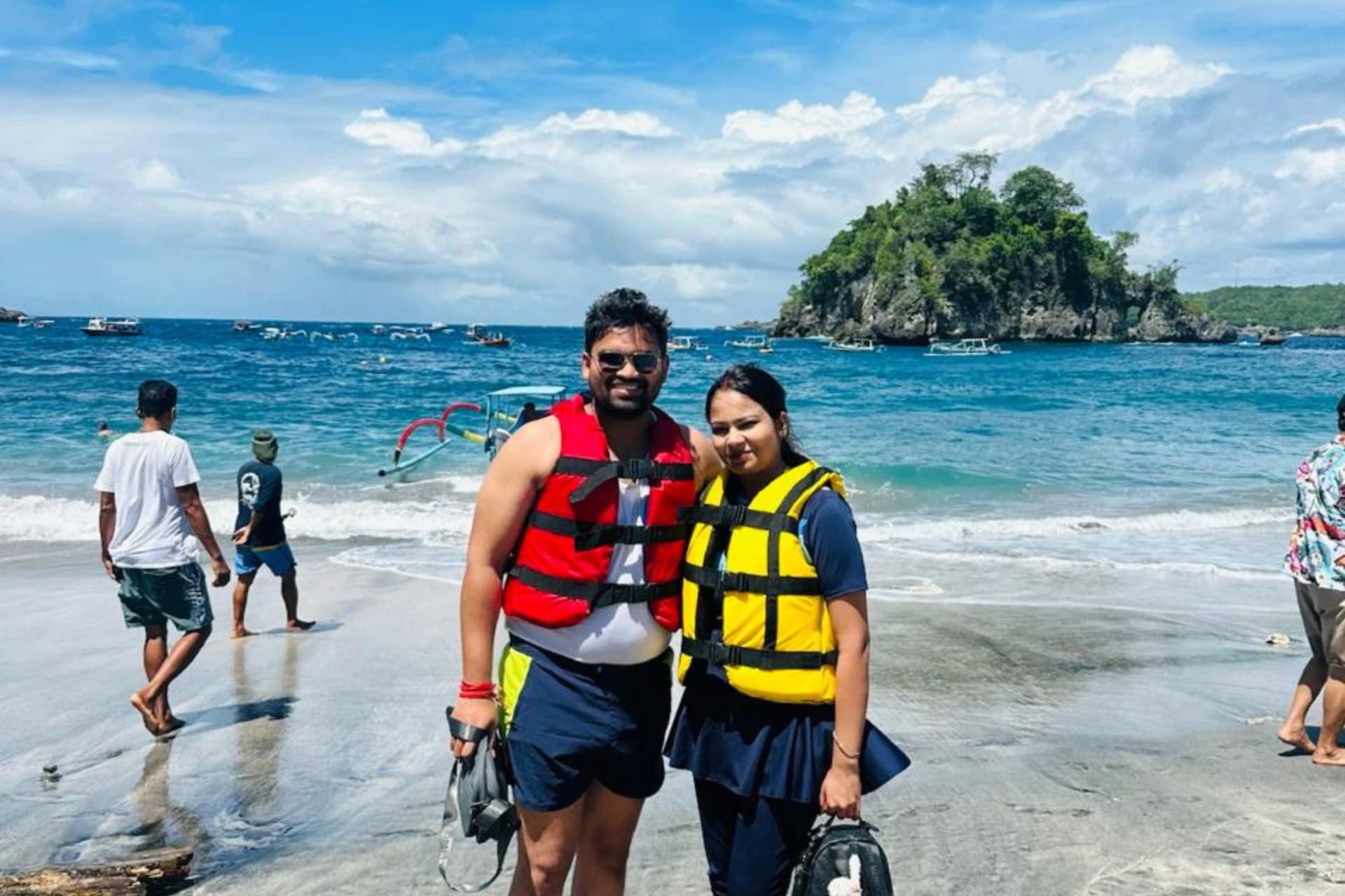 Couple in life jackets at Crystal Bay beach