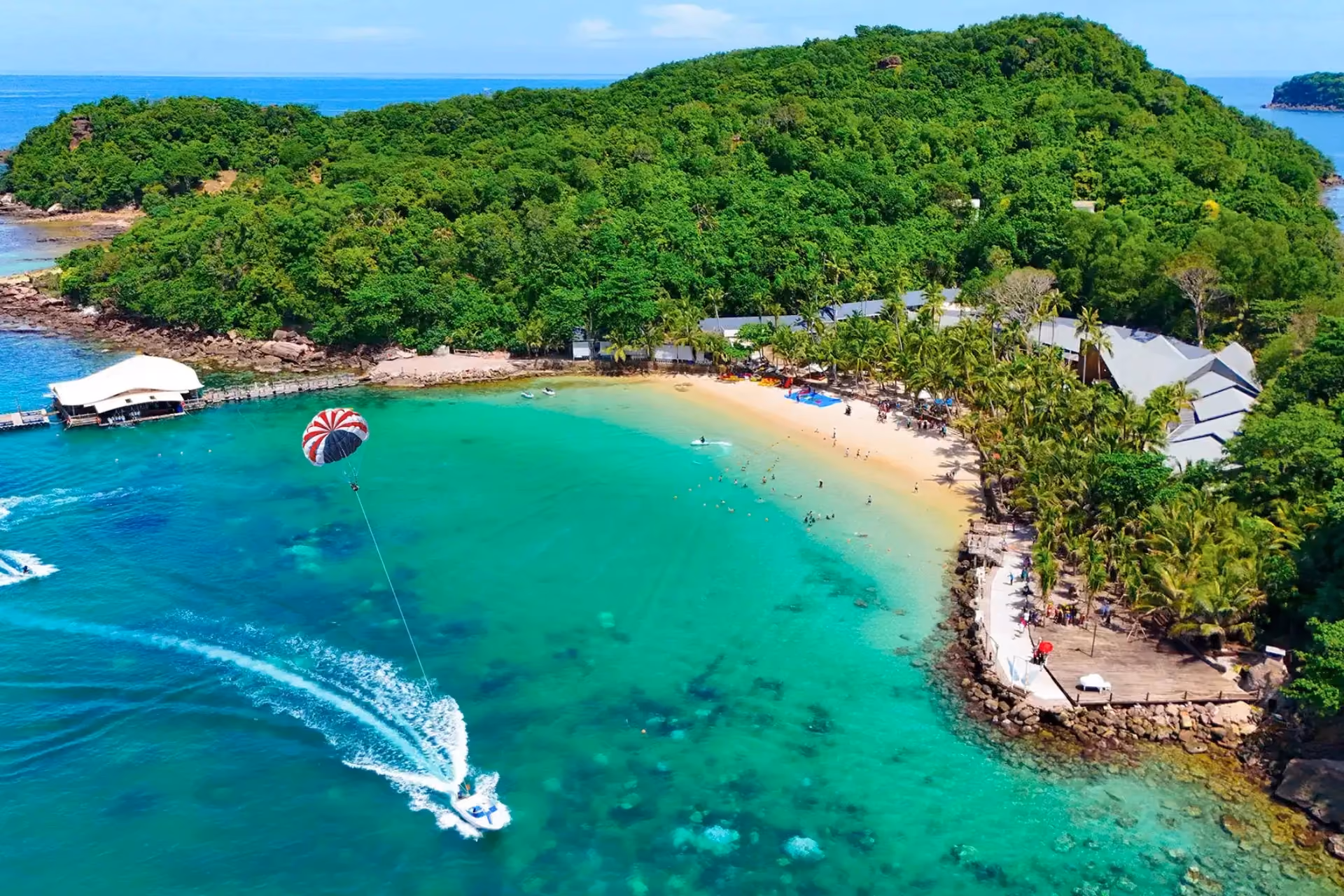 Parasail over blue-green water at Phu Quoc beach