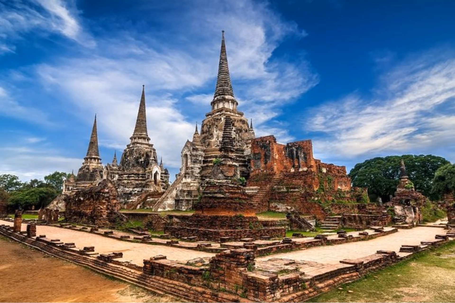Ancient temples with pointed towers in Ayutthaya Thailand